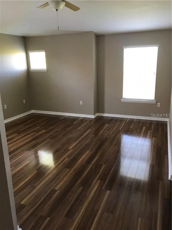 7542 Red Mill Circle New Port Richey, FL 34653 - Photo 17 of 27 a view of room with window