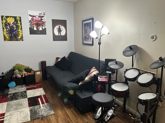 a living room with furniture and a table