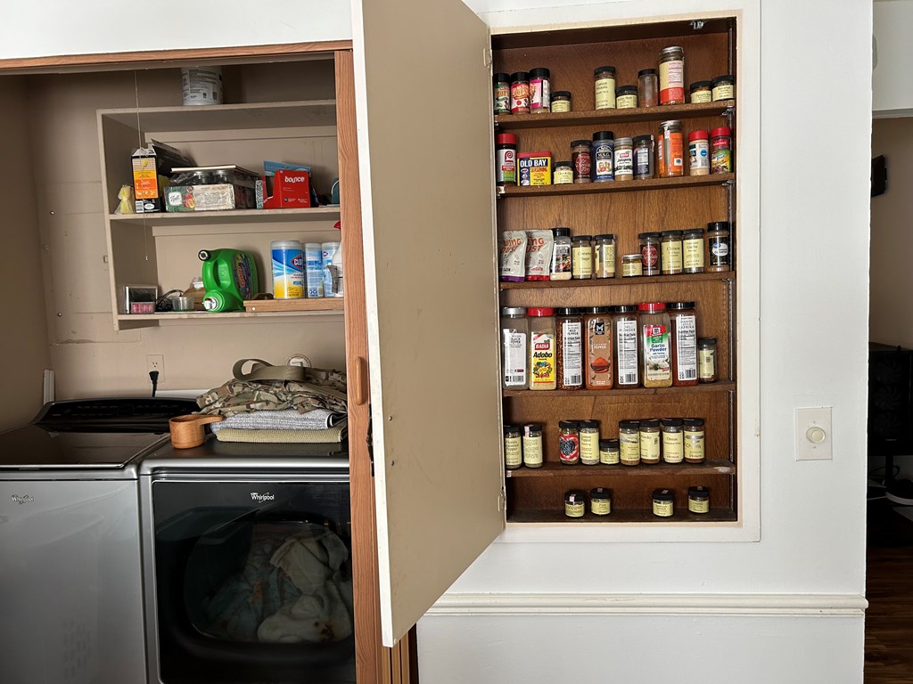 2125 13th Street, Unit 12 Columbus, GA 31906 - Photo 9 of 17 a kitchen with a refrigerator a stove and cabinets