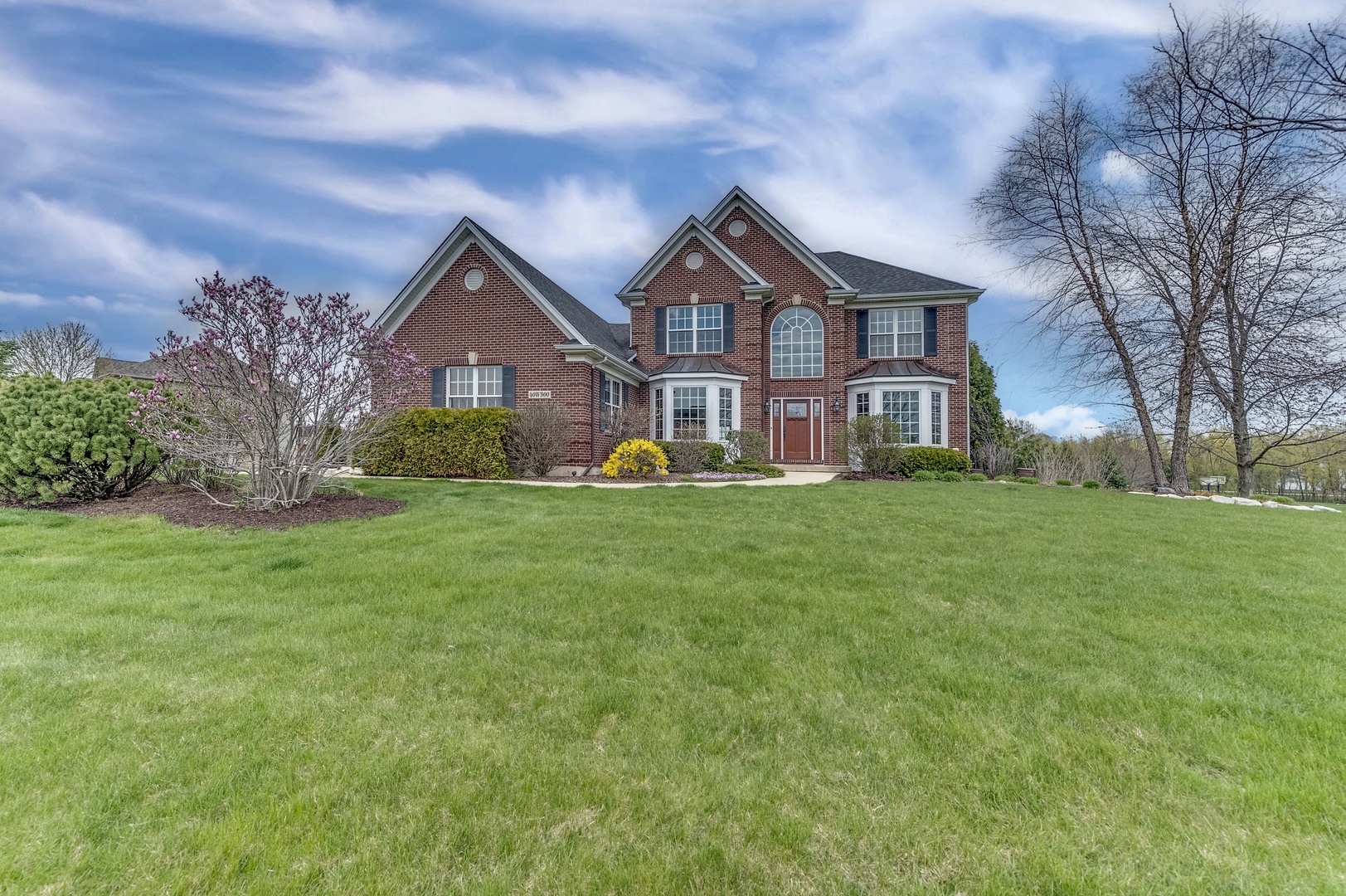 40W900 Campton Trail Road St. Charles, IL 60175 - Photo 1 of 31 a front view of house with yard and green space