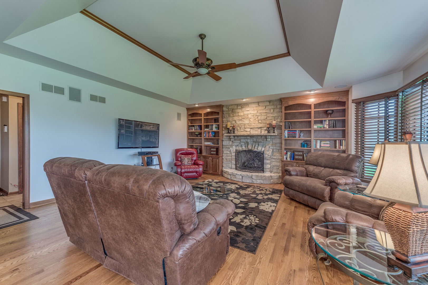 40W900 Campton Trail Road St. Charles, IL 60175 - Photo 17 of 31 a living room with furniture and a fireplace