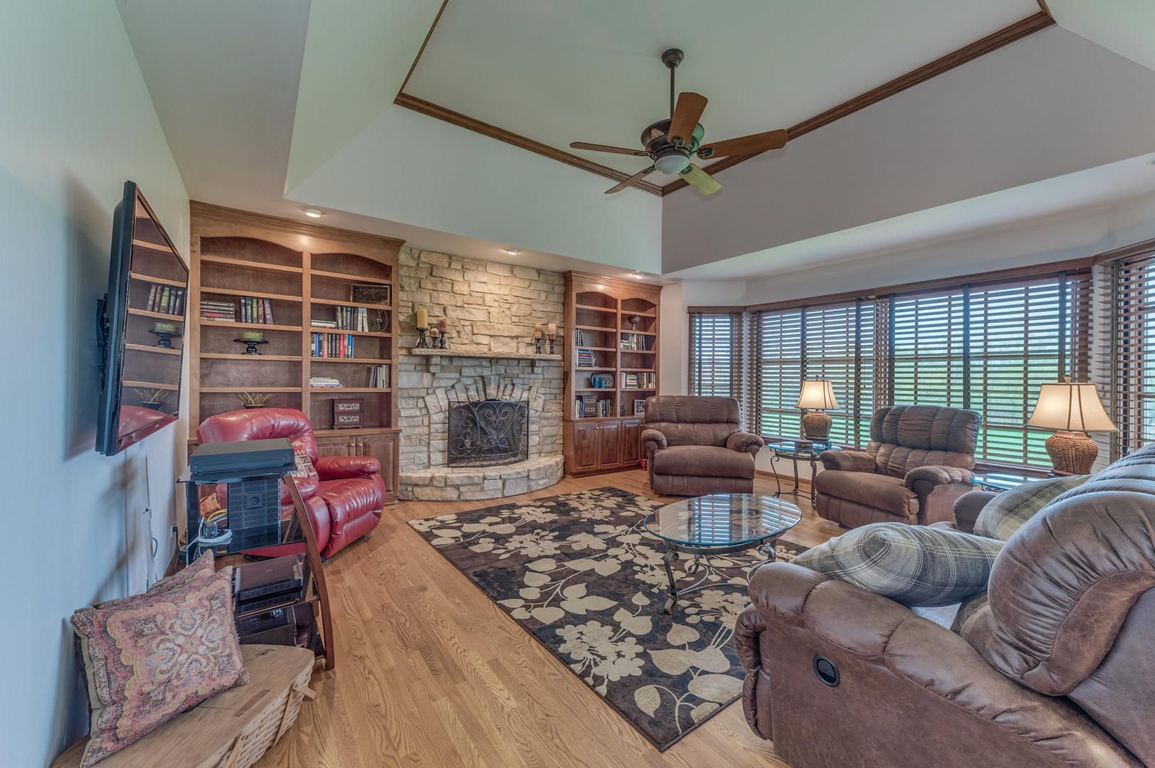 40W900 Campton Trail Road St. Charles, IL 60175 - Photo 18 of 31 a living room with furniture and a fireplace