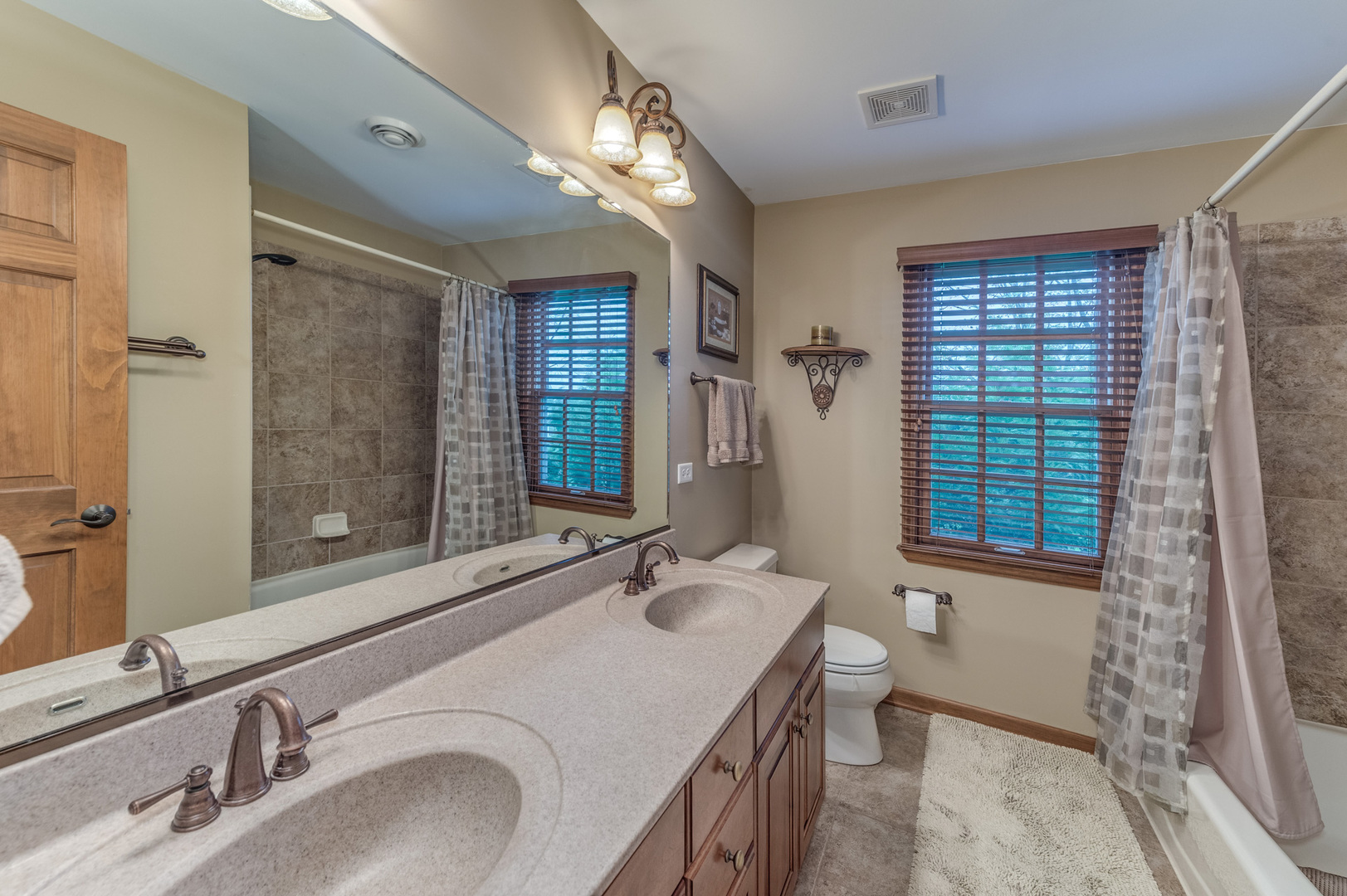 40W900 Campton Trail Road St. Charles, IL 60175 - Photo 24 of 31 a bathroom with a sink double vanity and a mirror