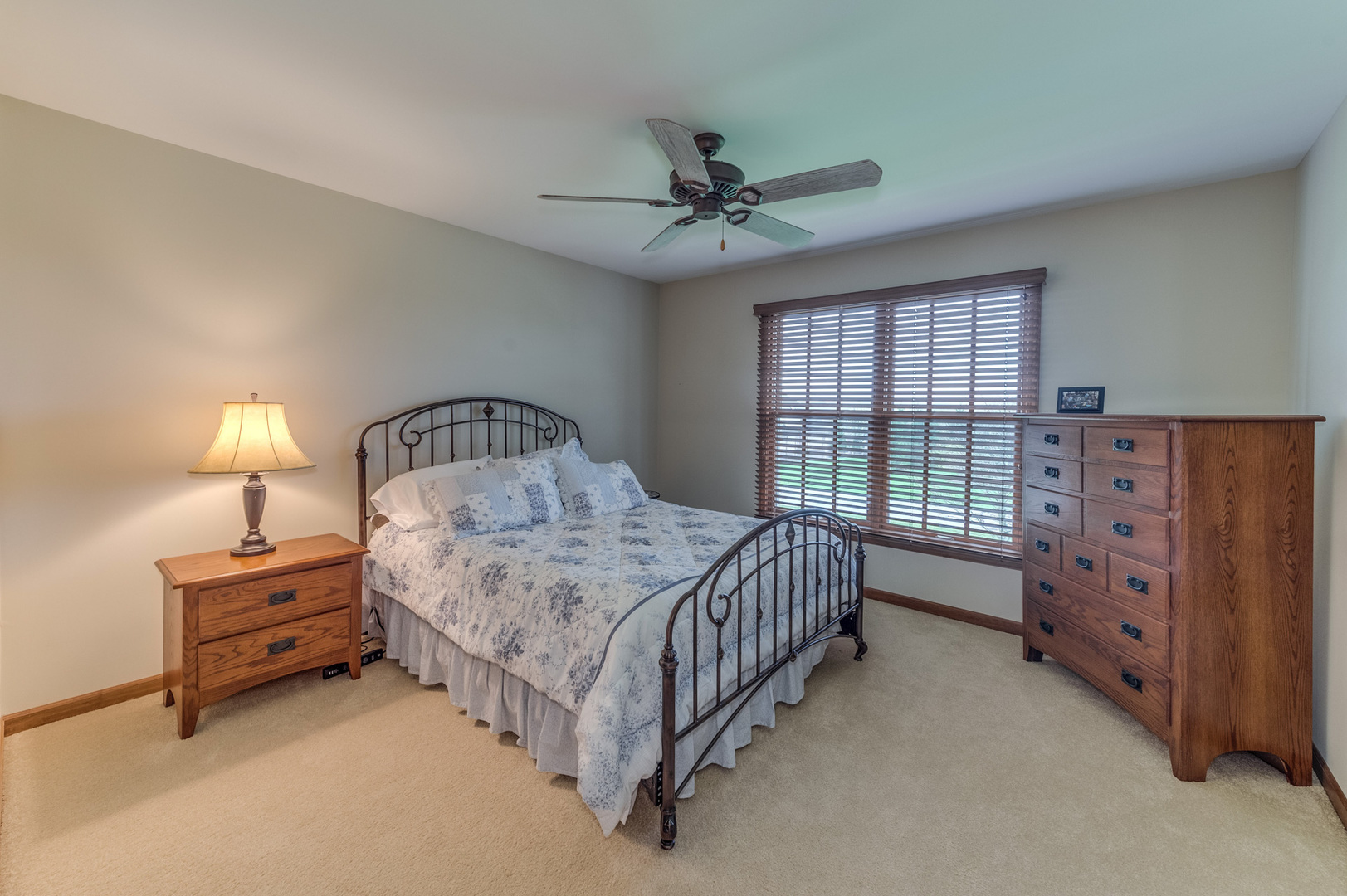 40W900 Campton Trail Road St. Charles, IL 60175 - Photo 25 of 31 a bedroom with a bed dresser and a window
