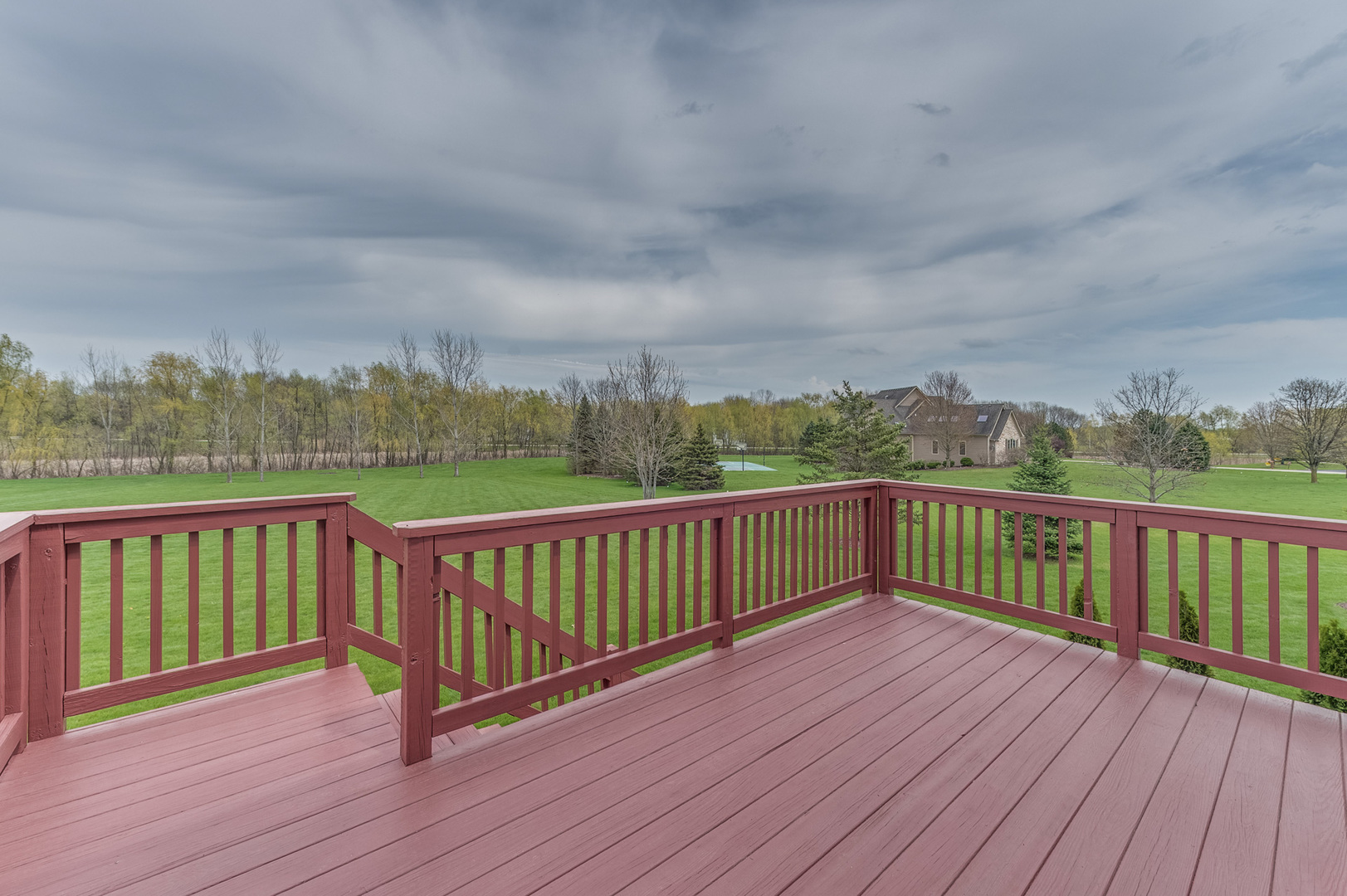 40W900 Campton Trail Road St. Charles, IL 60175 - Photo 27 of 31 a view of balcony with wooden floor and fence