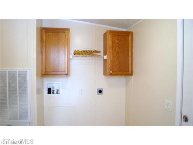 1029 Kayla Ridge Road Walnut Cove, NC 27052 - Photo 9 of 16 Laundry Room.