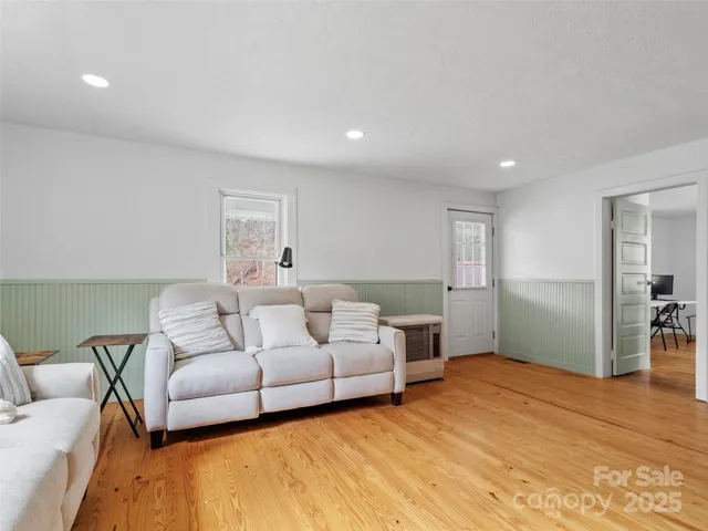 a kitchen with stainless steel appliances granite countertop a stove cabinets and refrigerator