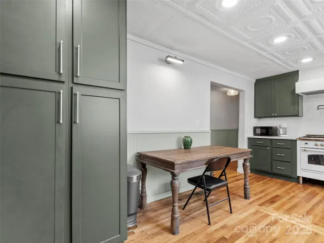 a bedroom with a bed and a ceiling fan