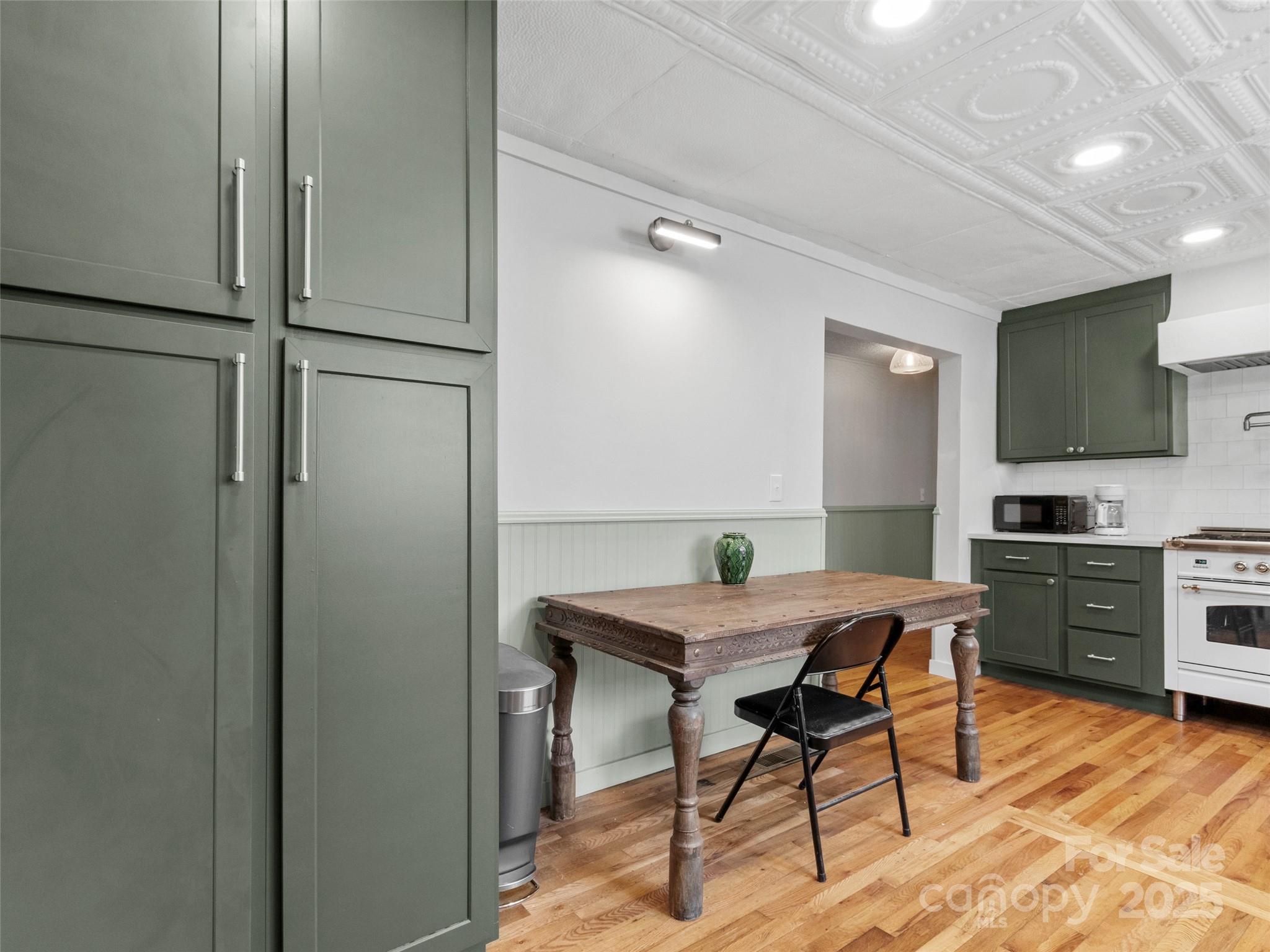 456 Windy Gap Road Mars Hill, NC 28754 - Photo 18 of 47 a view of a dining room with furniture