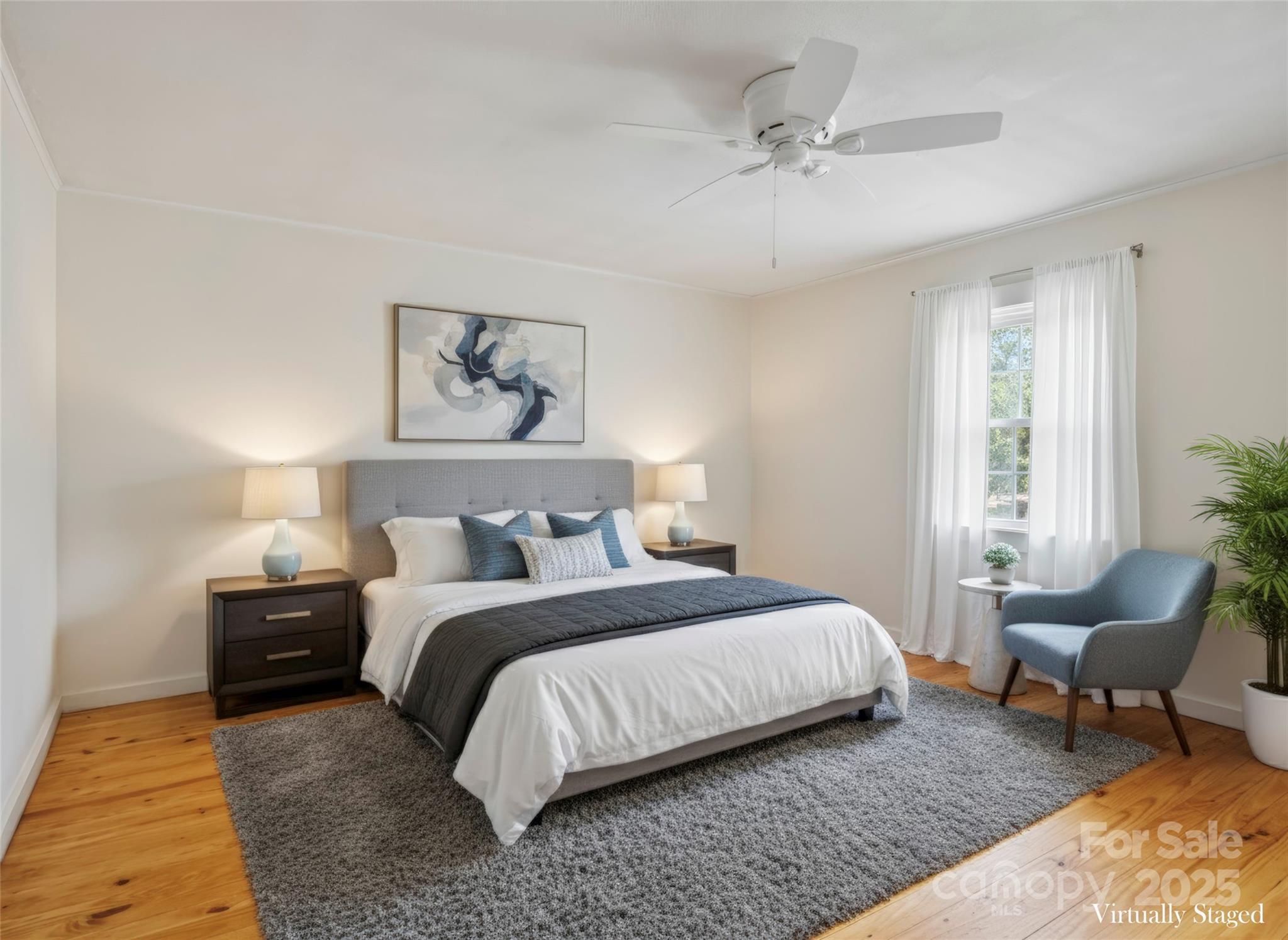 456 Windy Gap Road Mars Hill, NC 28754 - Photo 20 of 47 a bedroom with a bed and a couch