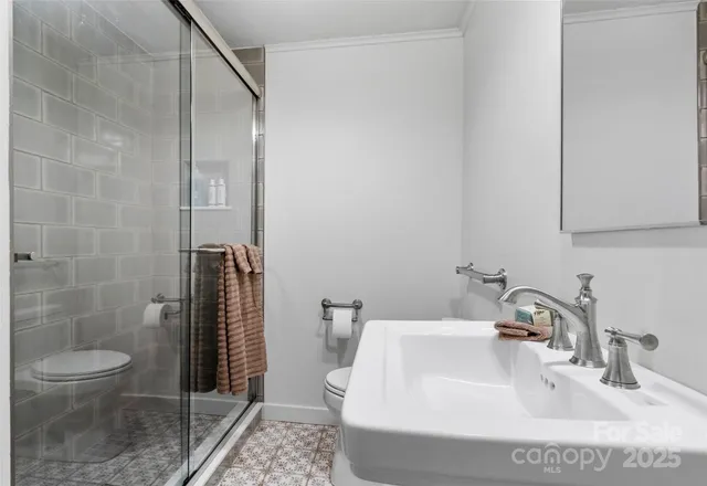 a close view of a utility room with washer and dryer