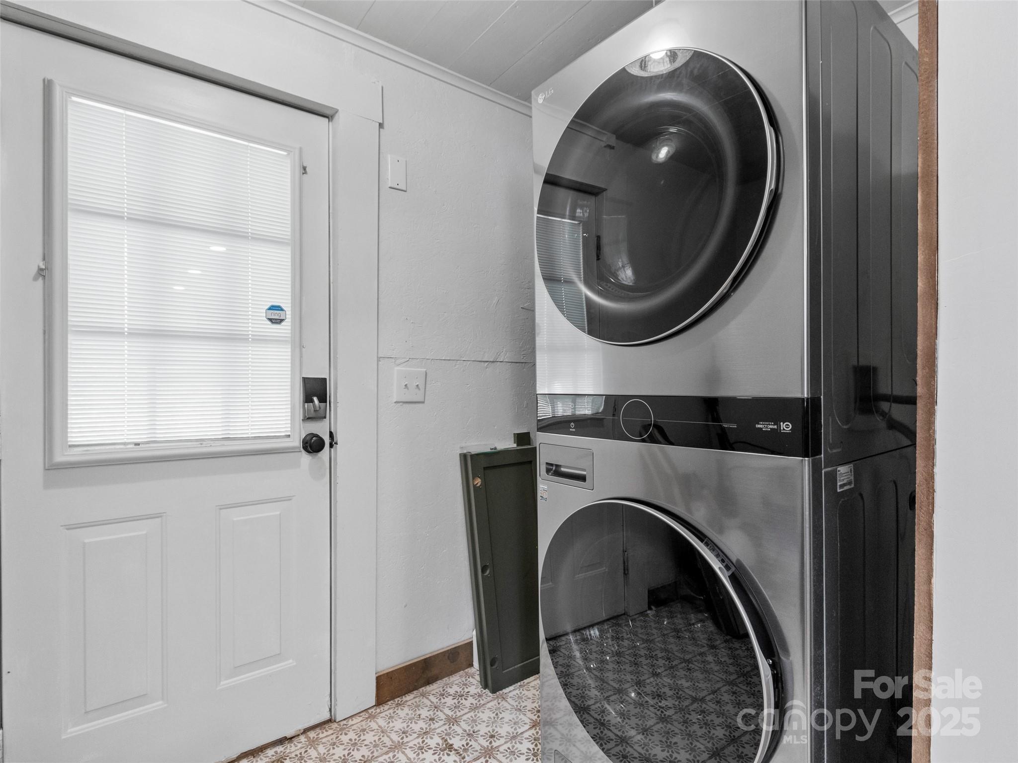 456 Windy Gap Road Mars Hill, NC 28754 - Photo 27 of 47 a close view of a utility room with washer and dryer