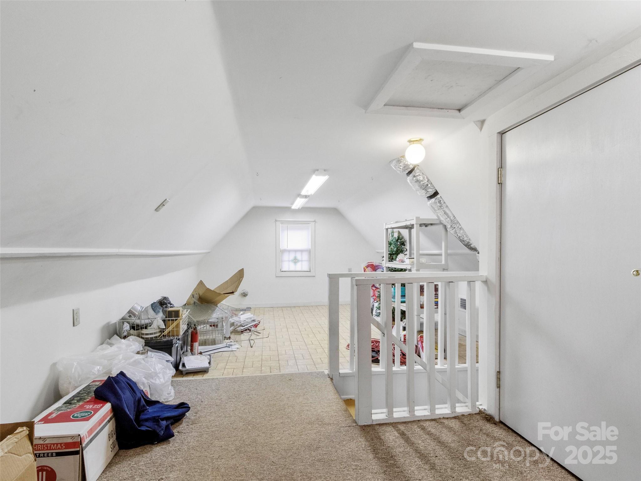 456 Windy Gap Road Mars Hill, NC 28754 - Photo 29 of 47 a view of a livingroom with furniture and white walls