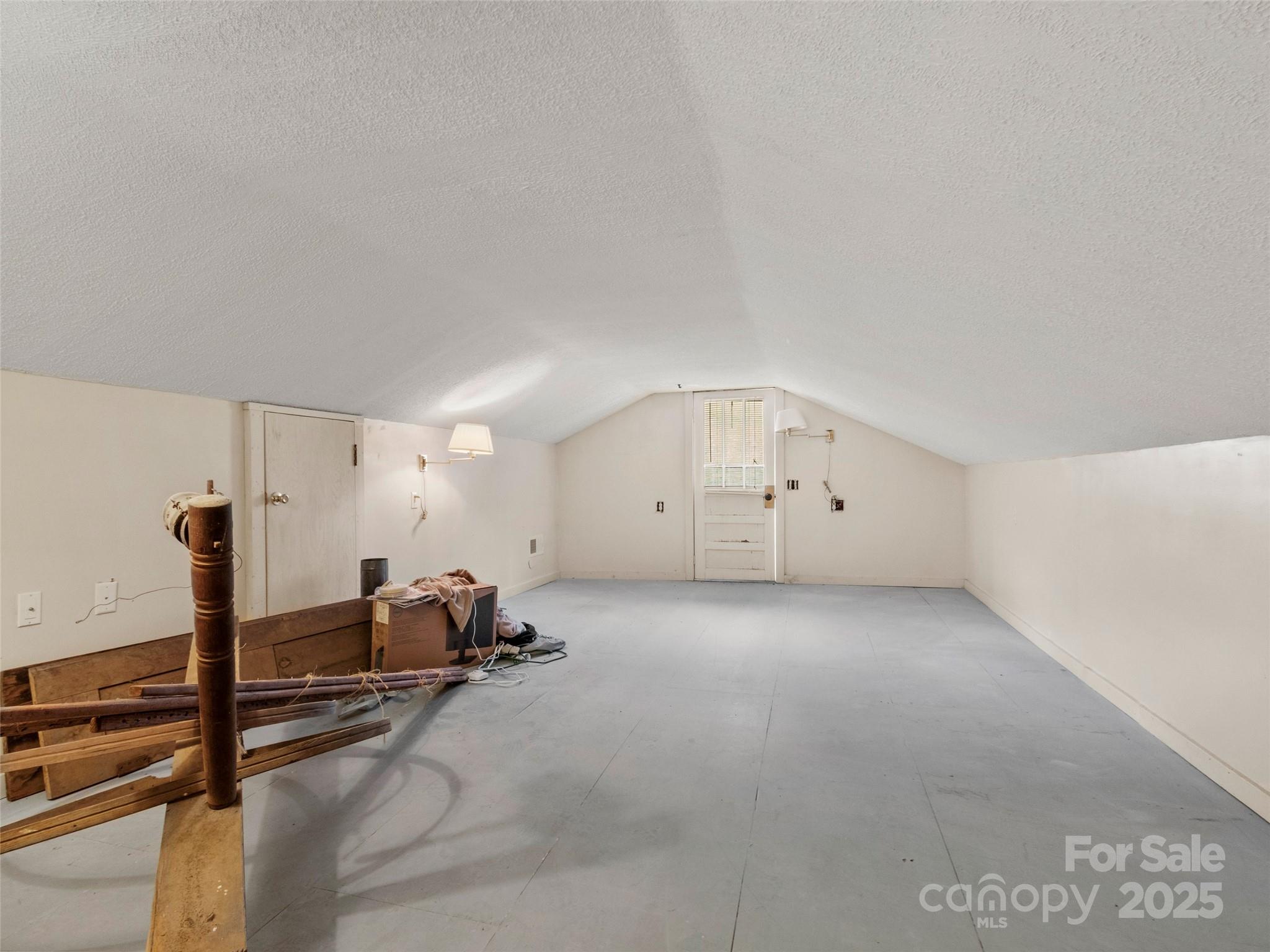 456 Windy Gap Road Mars Hill, NC 28754 - Photo 32 of 47 a view of a room with gym equipment
