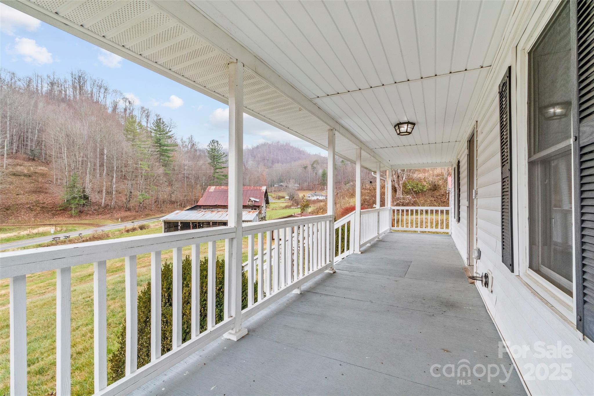 456 Windy Gap Road Mars Hill, NC 28754 - Photo 34 of 47 a view of a porch