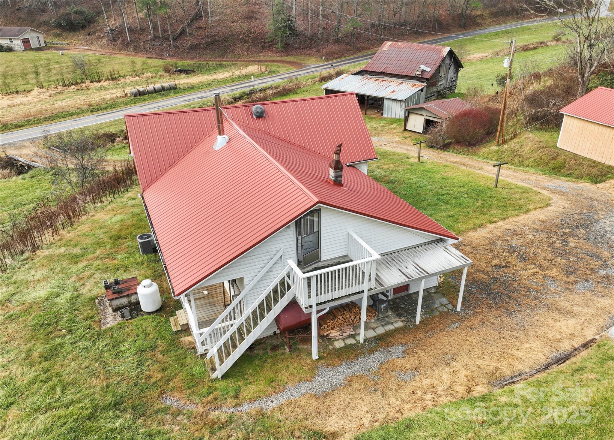 456 Windy Gap Road Mars Hill, NC 28754 - Photo 39 of 47 an aerial view of a house with a yard basket ball court and outdoor seating