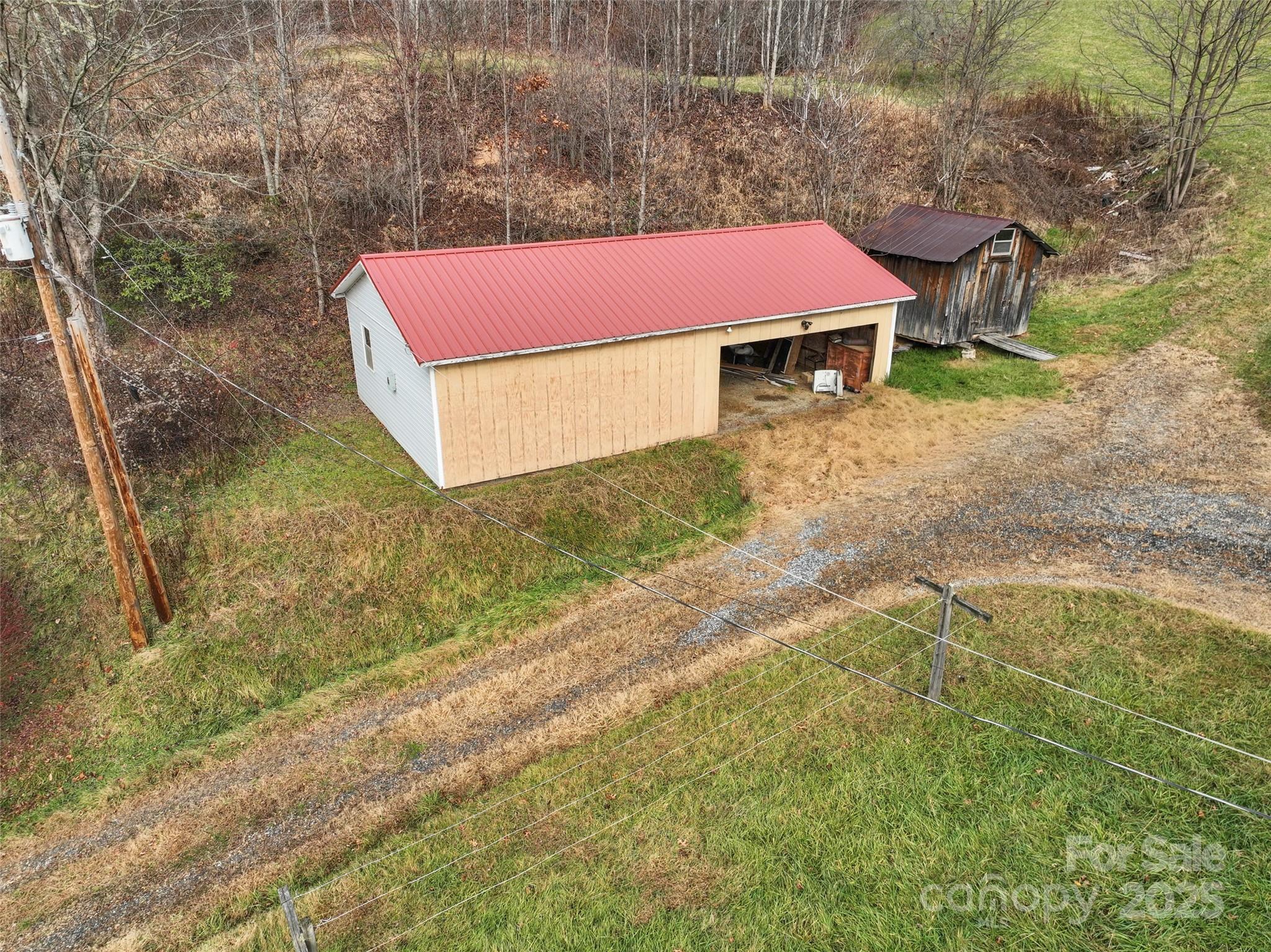 456 Windy Gap Road Mars Hill, NC 28754 - Photo 43 of 47 a view of a yard with an outdoor space