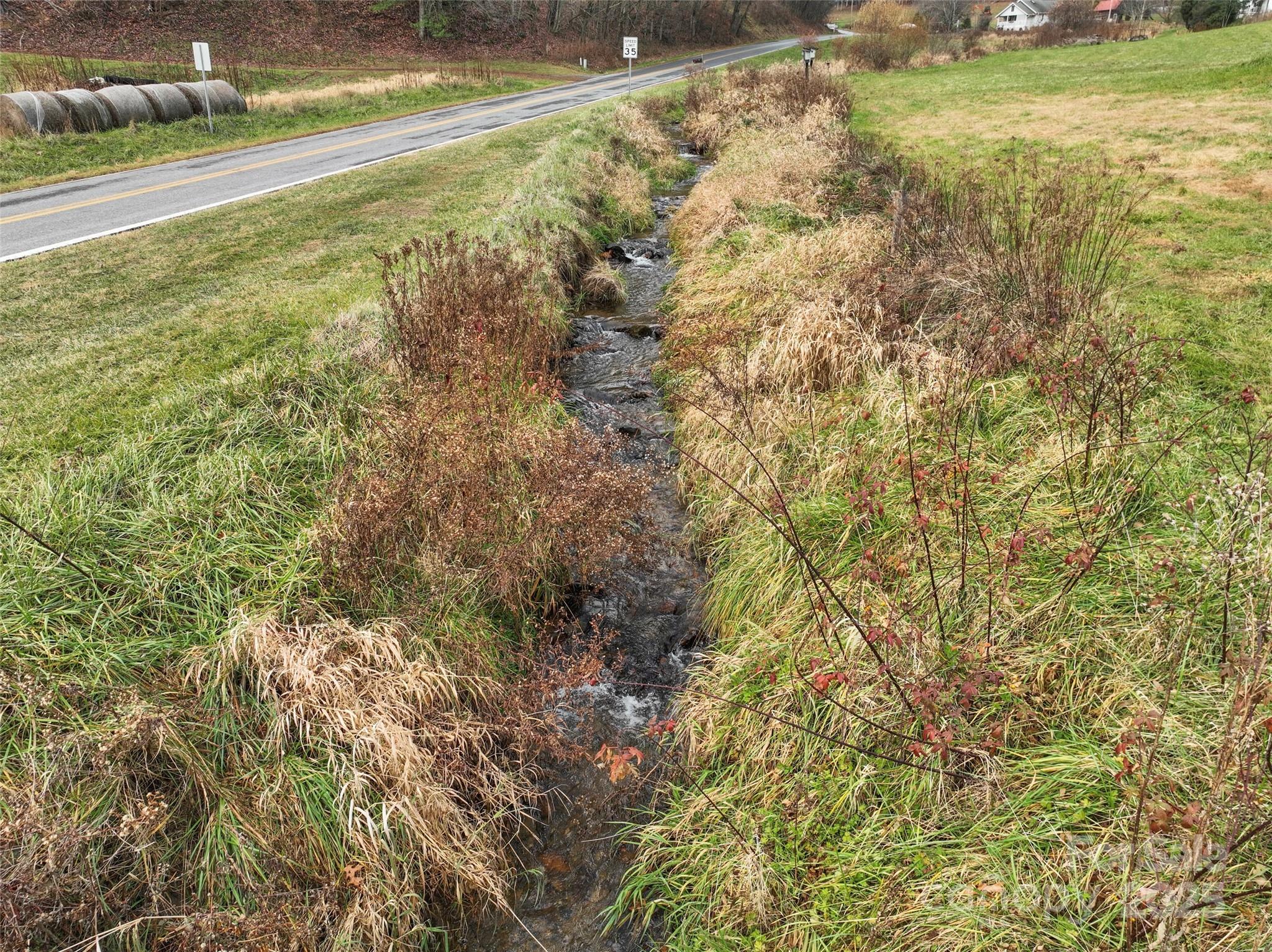 456 Windy Gap Road Mars Hill, NC 28754 - Photo 47 of 47 a view of an outdoor space and deck