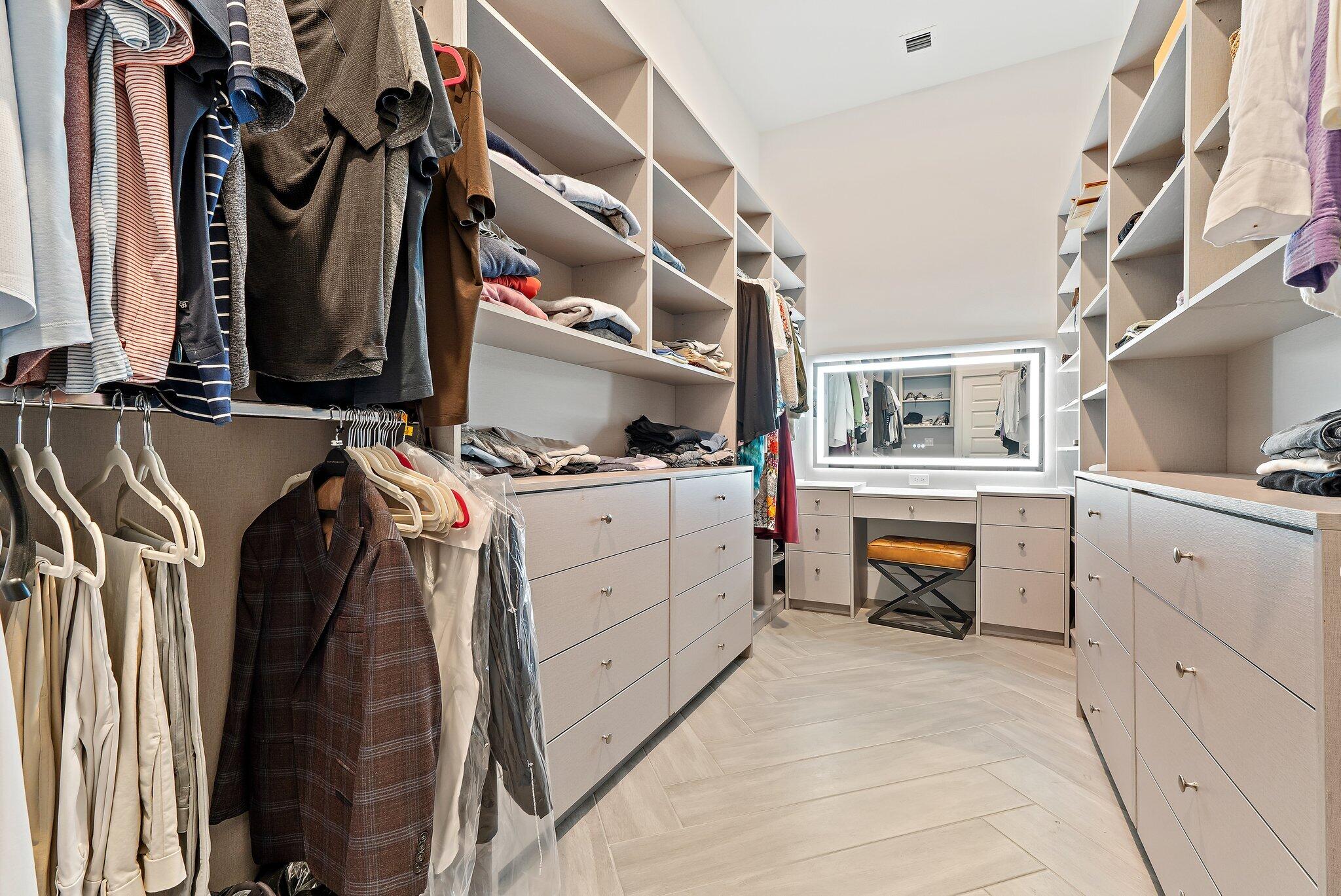 20049 Southeast Bridgewater Drive Jupiter, FL 33458 - Photo 11 of 77 a view of walk in closet with clothes and shoes