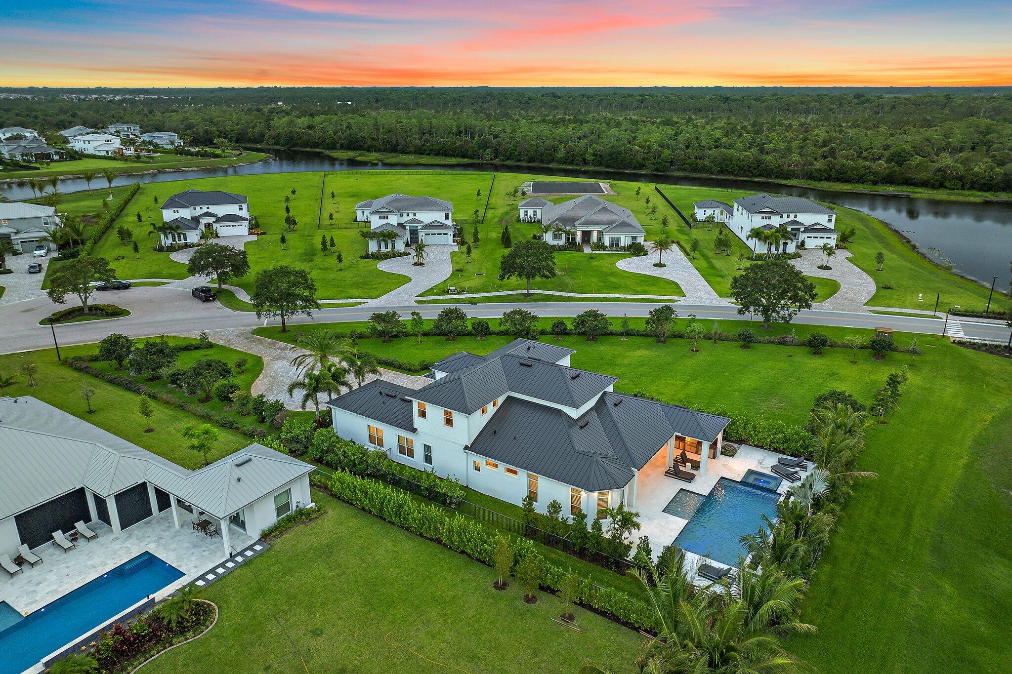 20049 Southeast Bridgewater Drive Jupiter, FL 33458 - Photo 33 of 77 a aerial view of a house with a garden and lake view