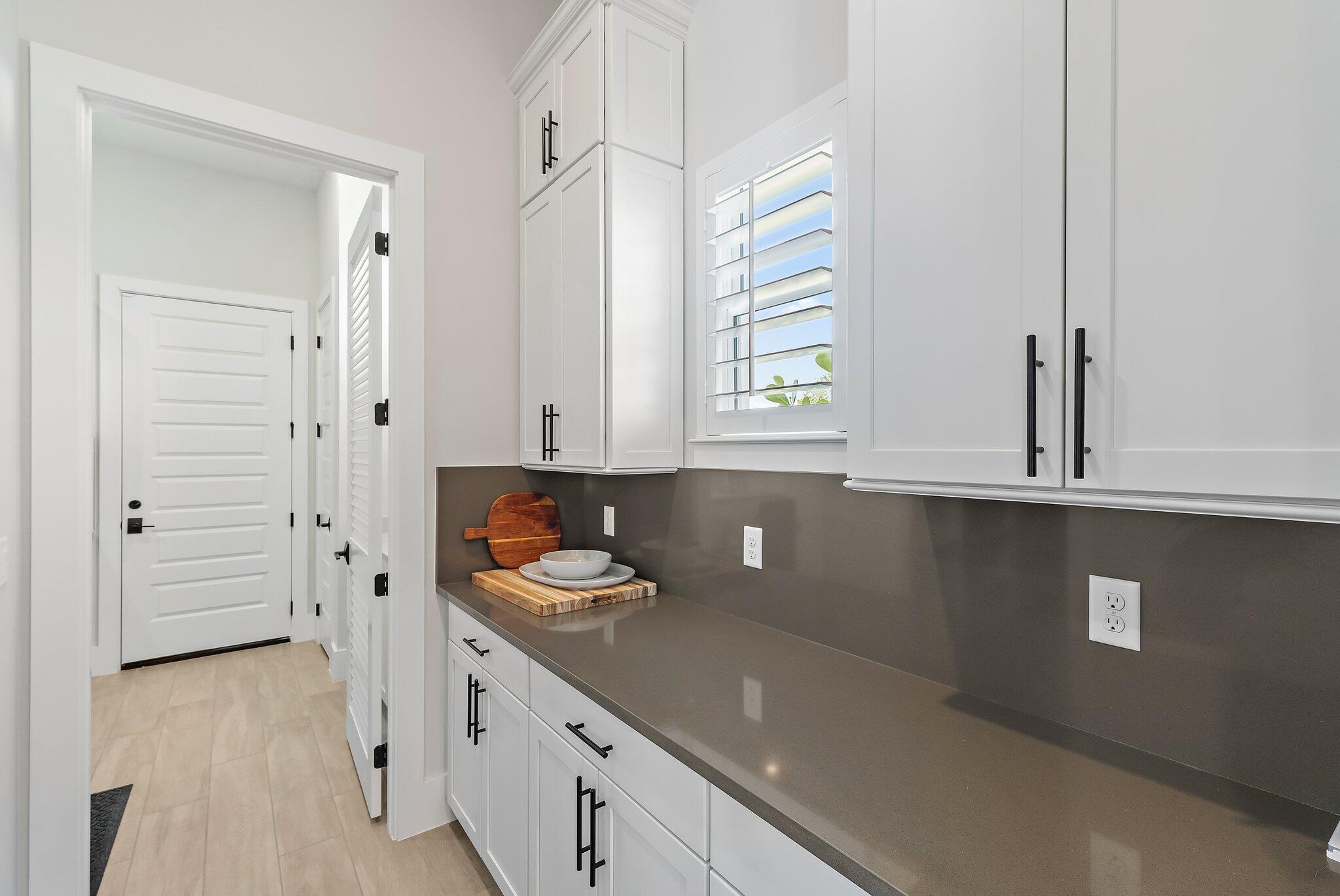 20049 Southeast Bridgewater Drive Jupiter, FL 33458 - Photo 58 of 77 Hall to Garage