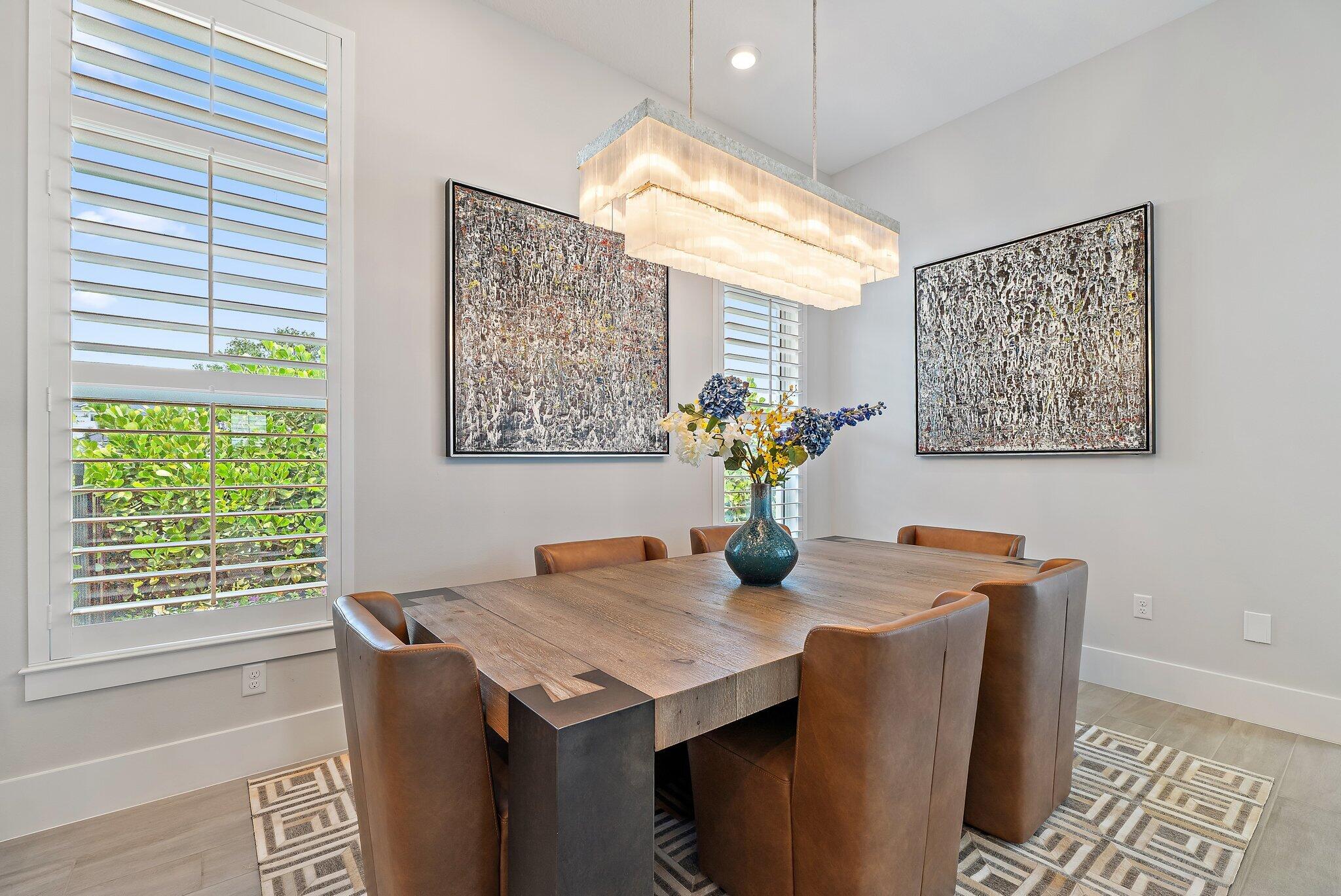 20049 Southeast Bridgewater Drive Jupiter, FL 33458 - Photo 60 of 77 a view of a dining room with furniture and window