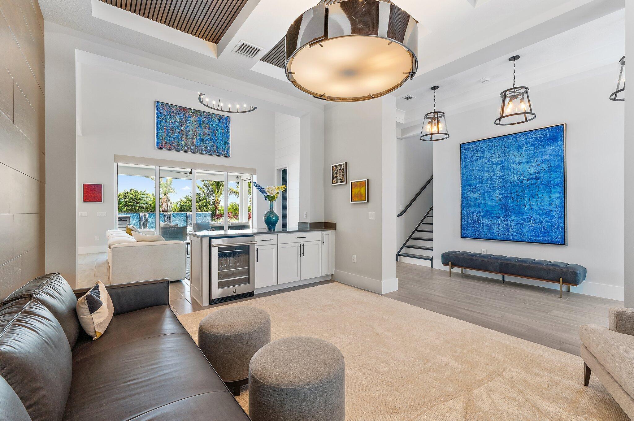 20049 Southeast Bridgewater Drive Jupiter, FL 33458 - Photo 7 of 77 a living room with furniture and a large window
