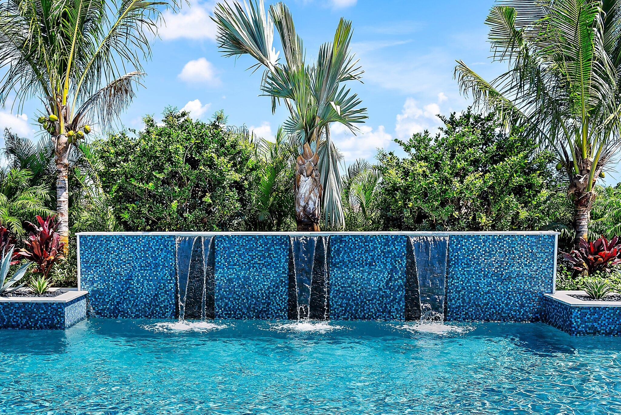 20049 Southeast Bridgewater Drive Jupiter, FL 33458 - Photo 77 of 77 a backyard of a house with plants and outdoor seating