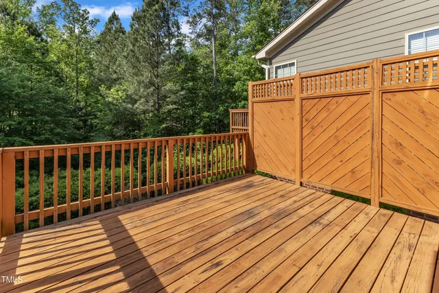 a bathroom with a bathtub and window