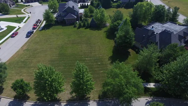 an aerial view of house with outdoor space