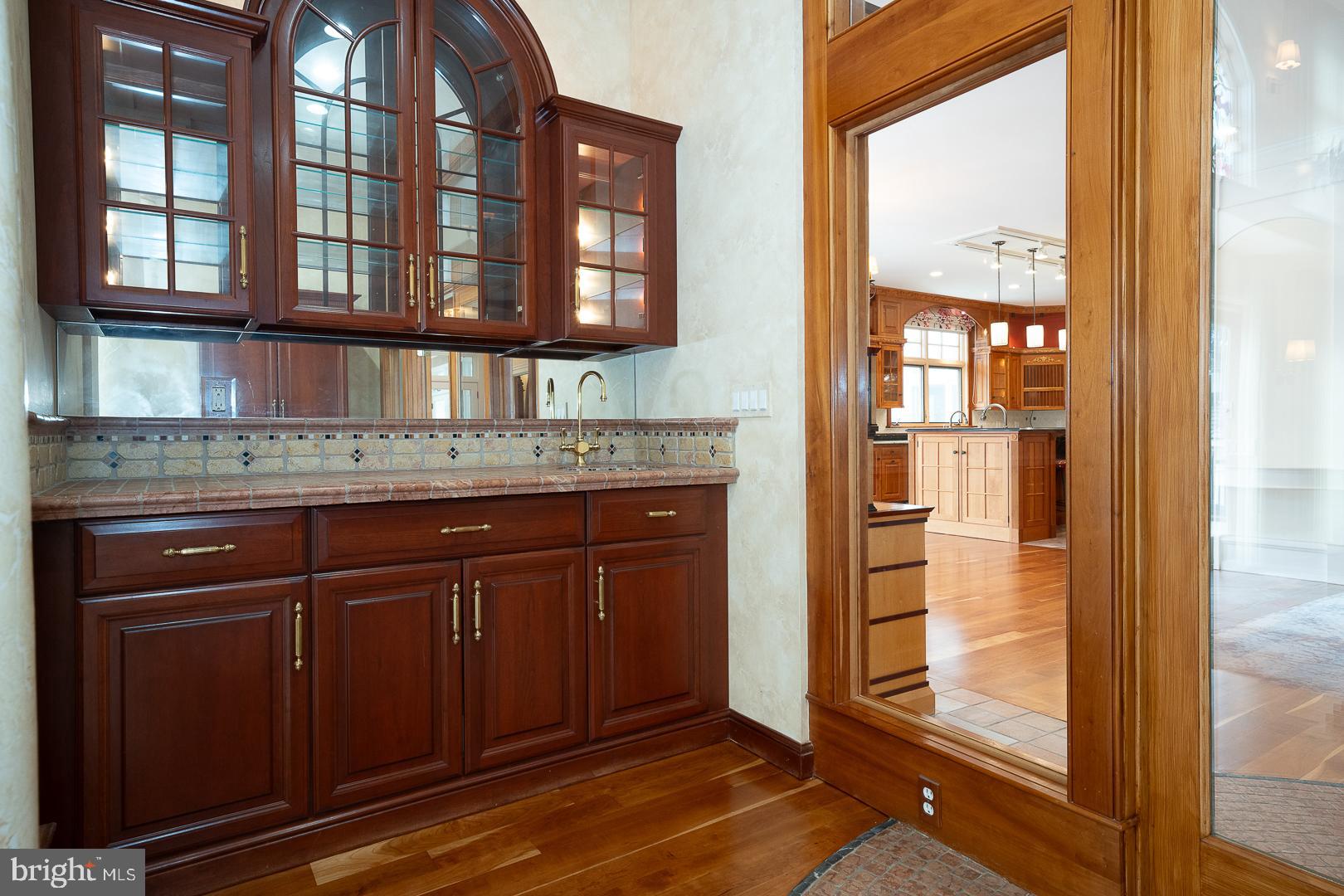 52 Mountain Laurel Lane Malvern, PA 19355 - Photo 18 of 58 a bathroom with a granite countertop sink and a mirror