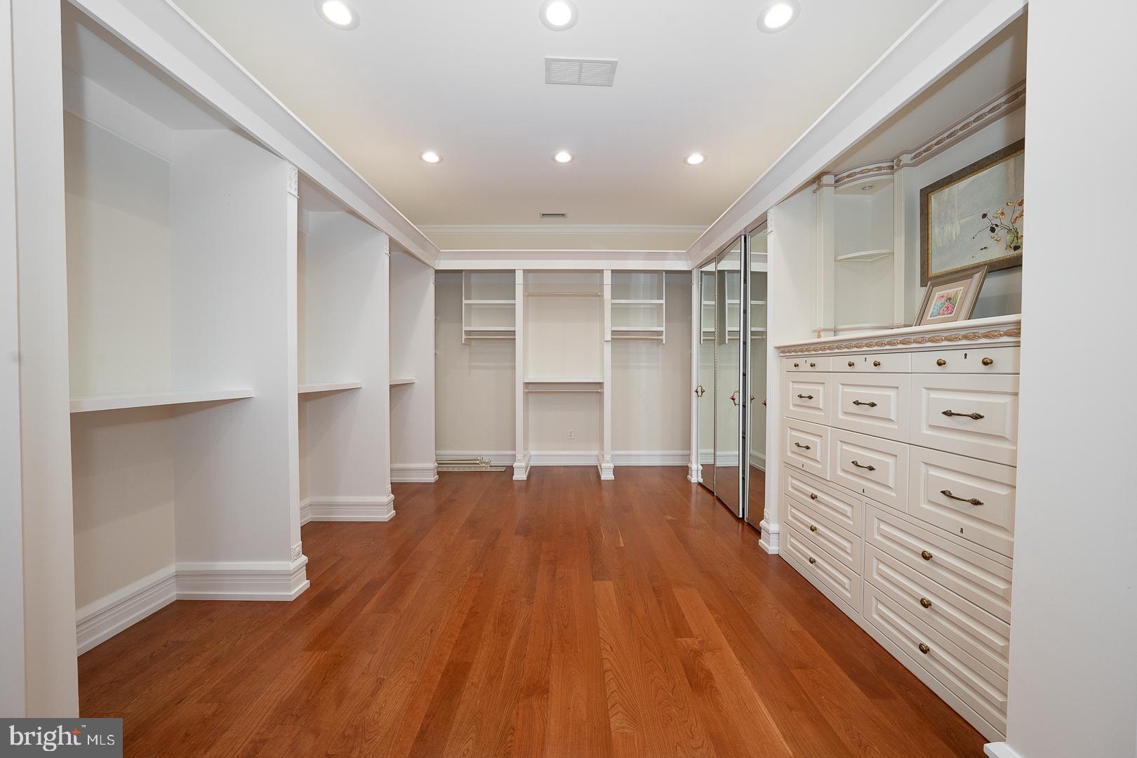 52 Mountain Laurel Lane Malvern, PA 19355 - Photo 24 of 58 a view of an empty room with wooden floor and cabinet