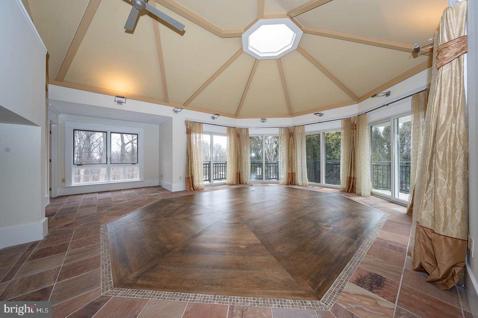 52 Mountain Laurel Lane Malvern, PA 19355 - Photo 49 of 58 a view of an empty room with a window and chandelier
