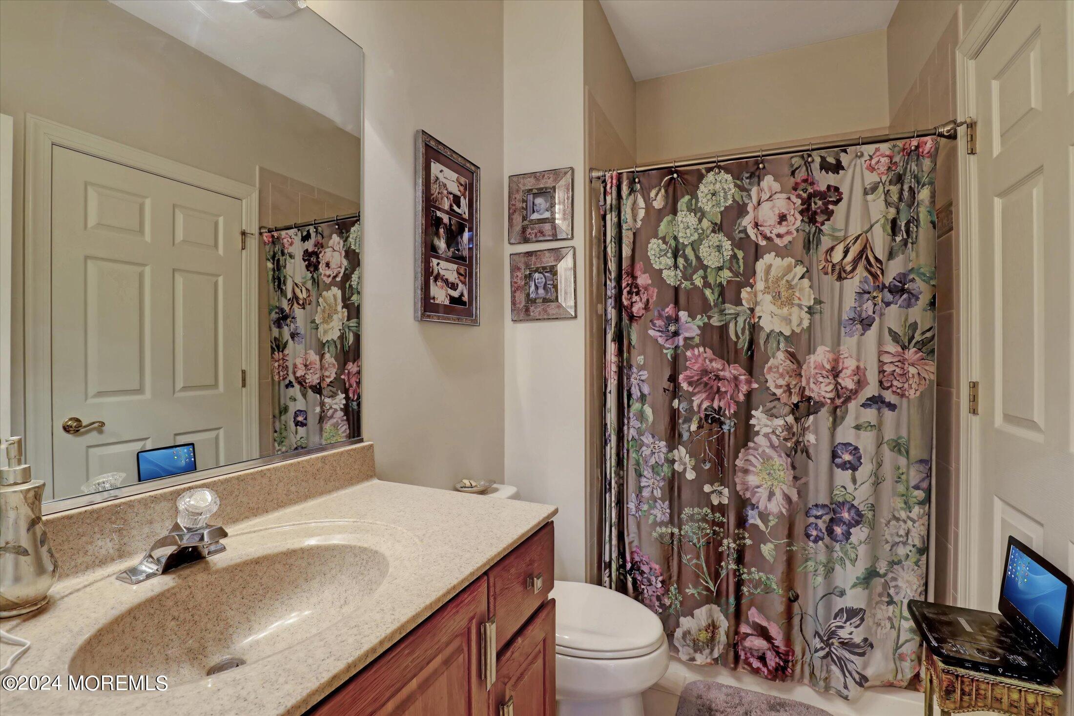 9 Shady Tree Lane Colts Neck, NJ 07722 - Photo 27 of 60 a bathroom with a sink toilet and shower