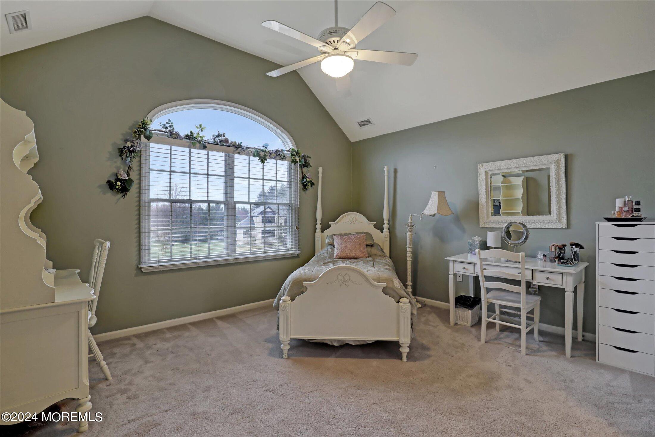9 Shady Tree Lane Colts Neck, NJ 07722 - Photo 38 of 60 a living room with furniture a chandelier and a window