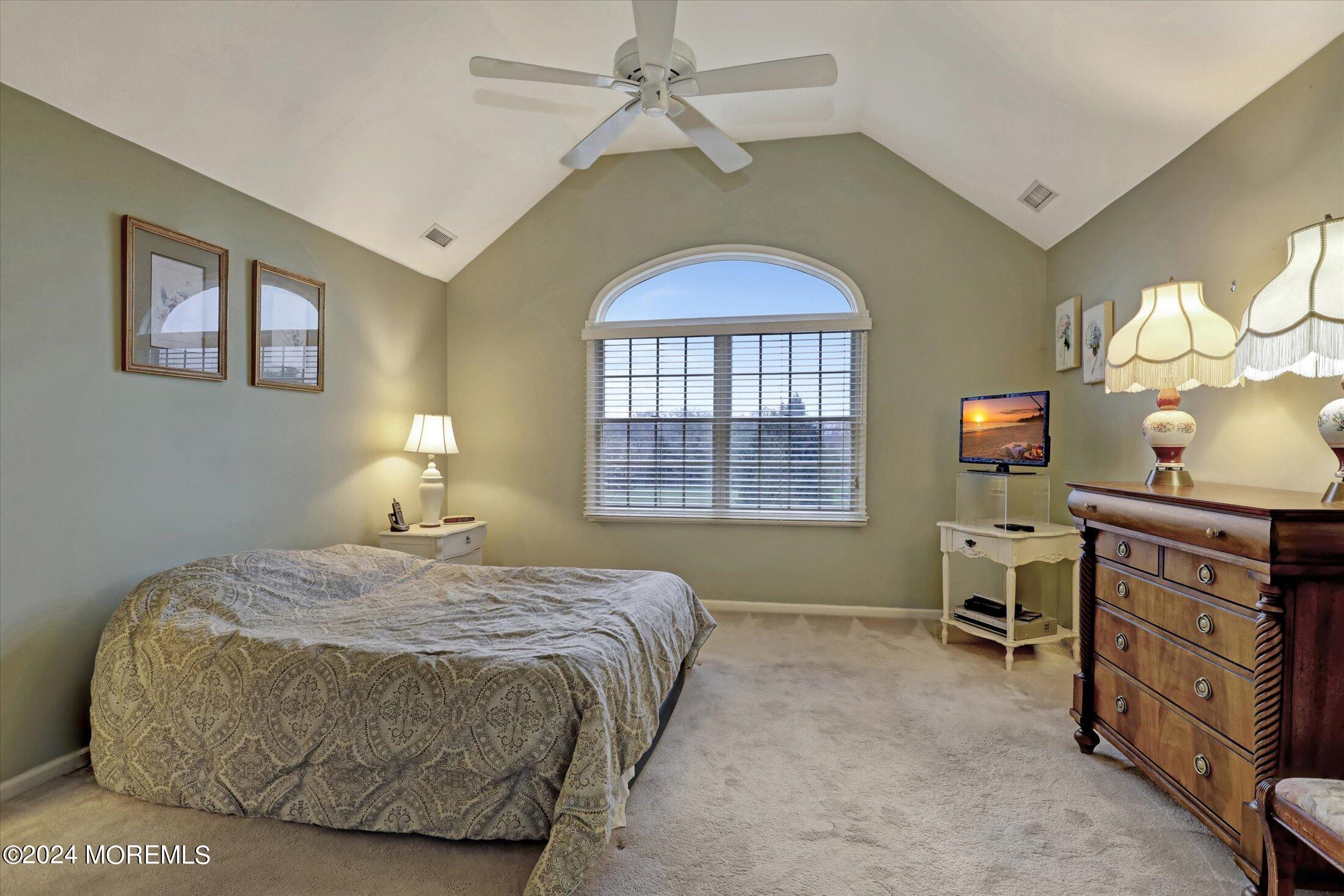 9 Shady Tree Lane Colts Neck, NJ 07722 - Photo 43 of 60 a bedroom with a bed and a window