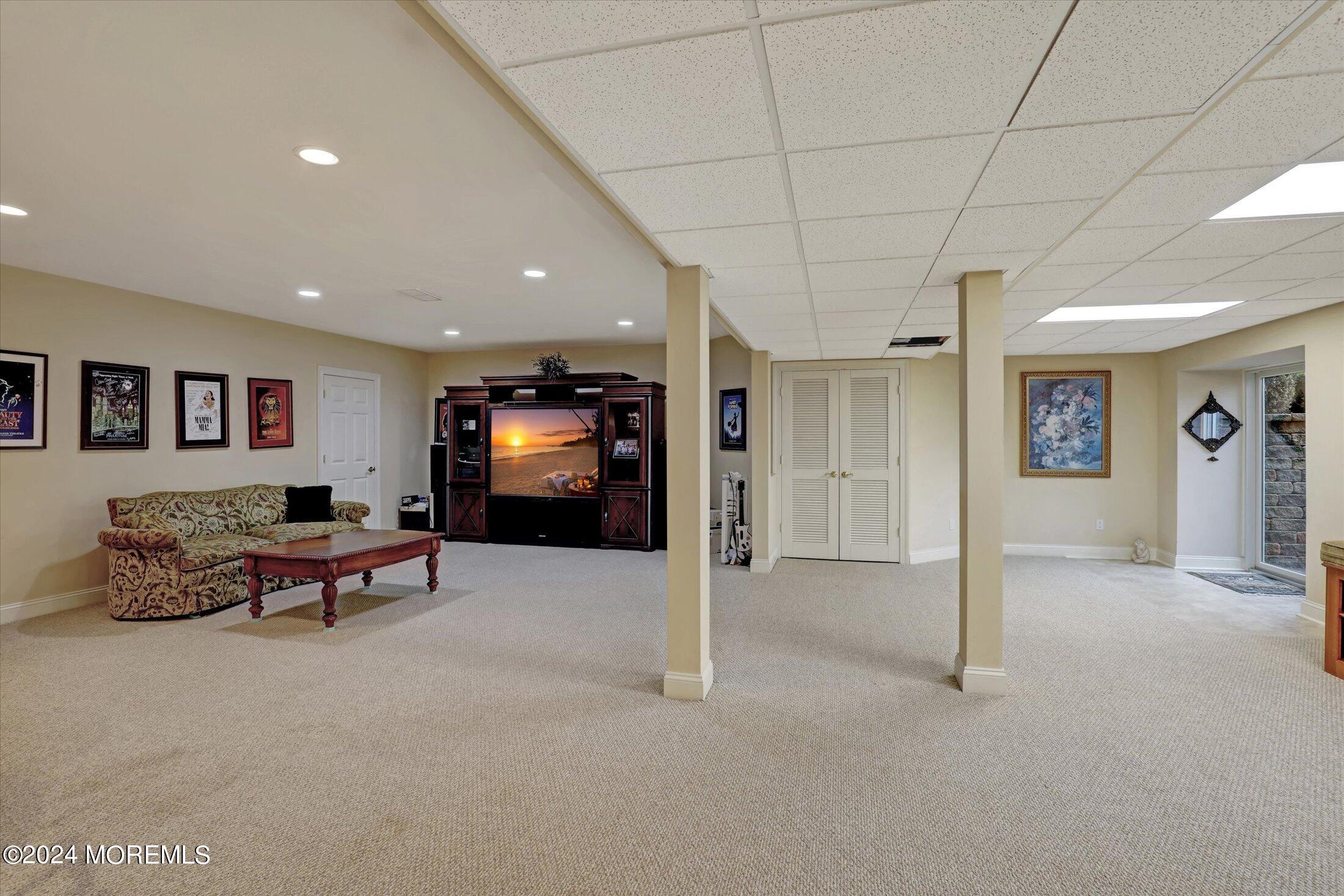 9 Shady Tree Lane Colts Neck, NJ 07722 - Photo 46 of 60 a lobby with furniture and window