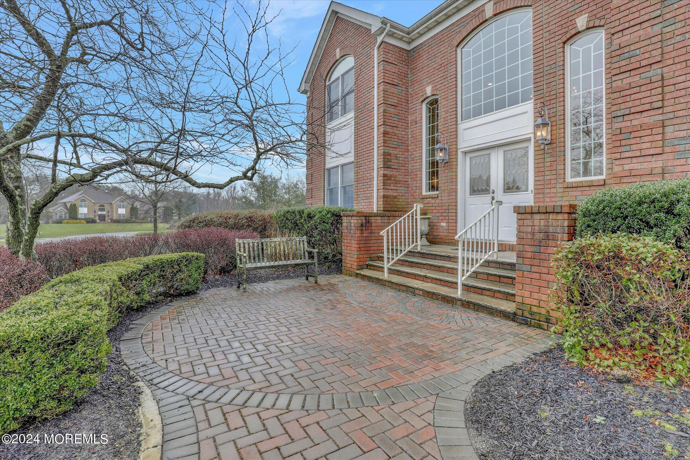 9 Shady Tree Lane Colts Neck, NJ 07722 - Photo 5 of 60 a view of a house with a yard