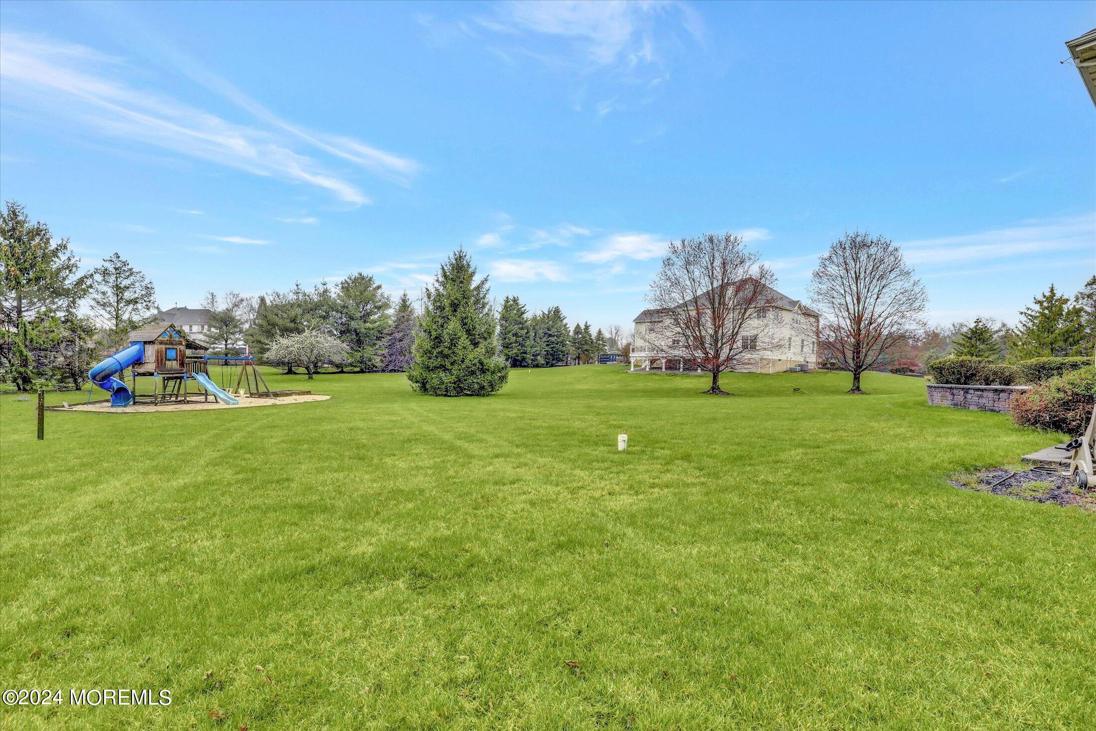 9 Shady Tree Lane Colts Neck, NJ 07722 - Photo 58 of 60 a view of field with trees in the background