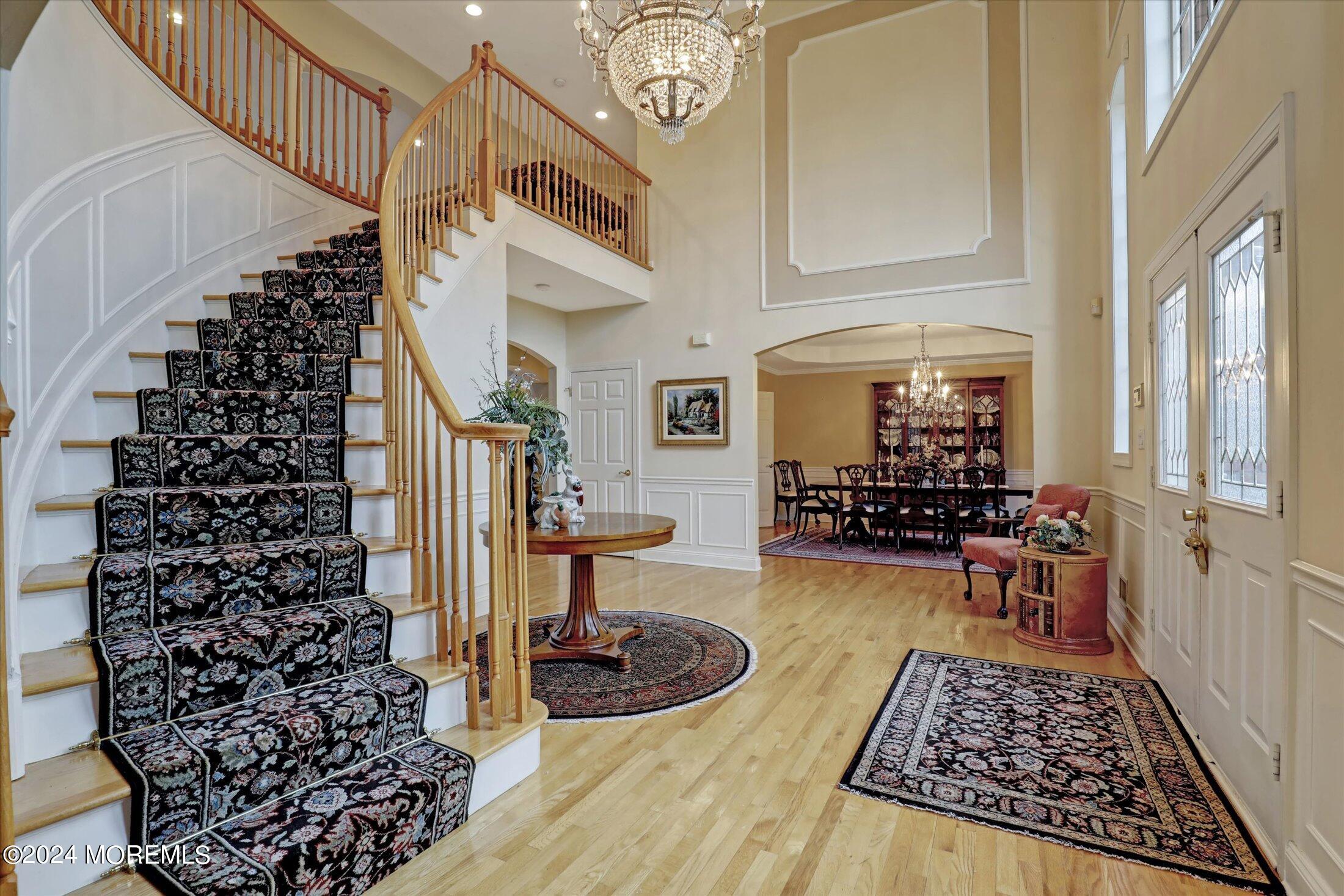 9 Shady Tree Lane Colts Neck, NJ 07722 - Photo 7 of 60 a living room with furniture and a rug