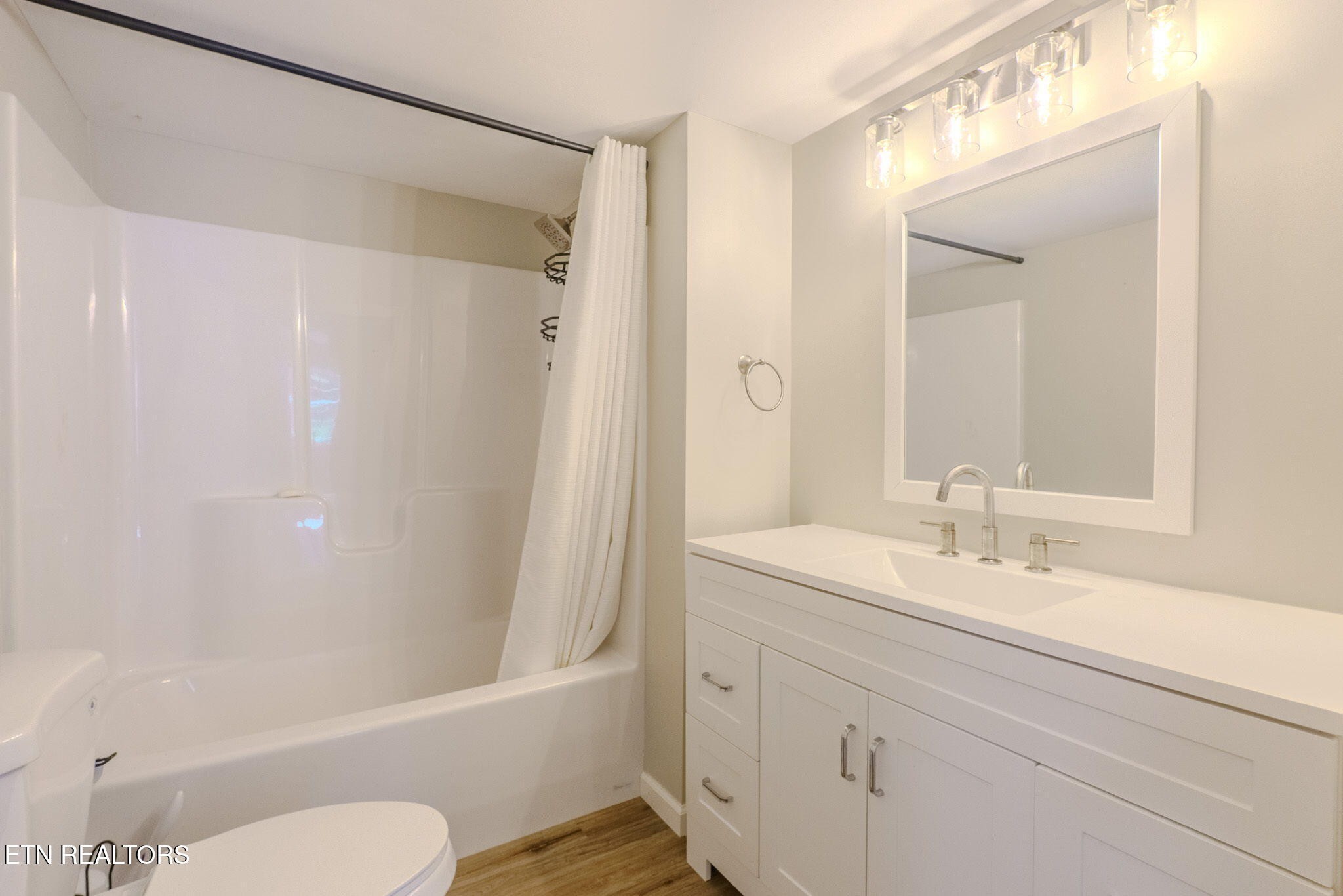 2331 Webb Road Sevierville, TN 37876 - Photo 17 of 23 a bathroom with a sink toilet and shower