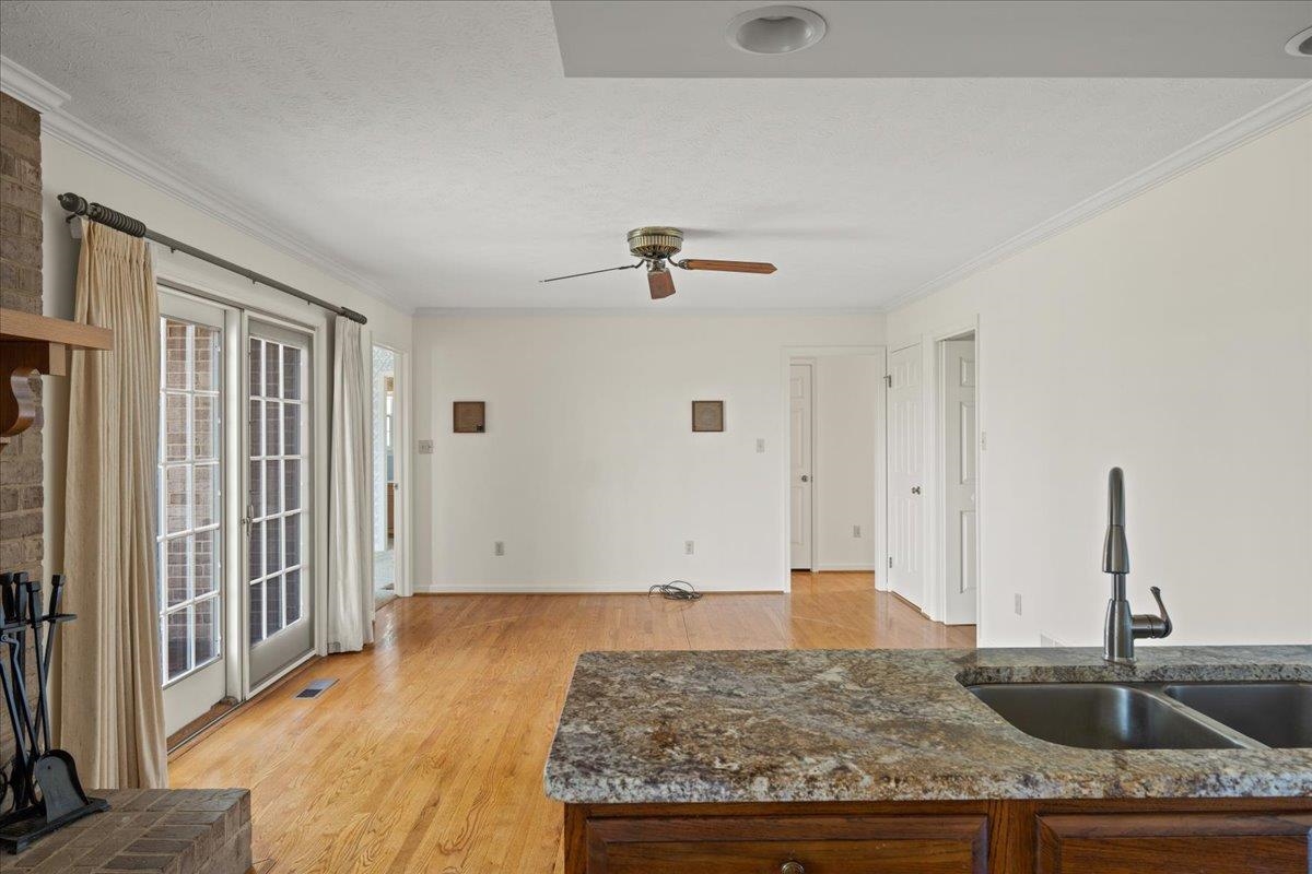 140 Swisher Road Staunton, VA 24401 - Photo 19 of 53 a kitchen with granite countertop sink and refrigerator