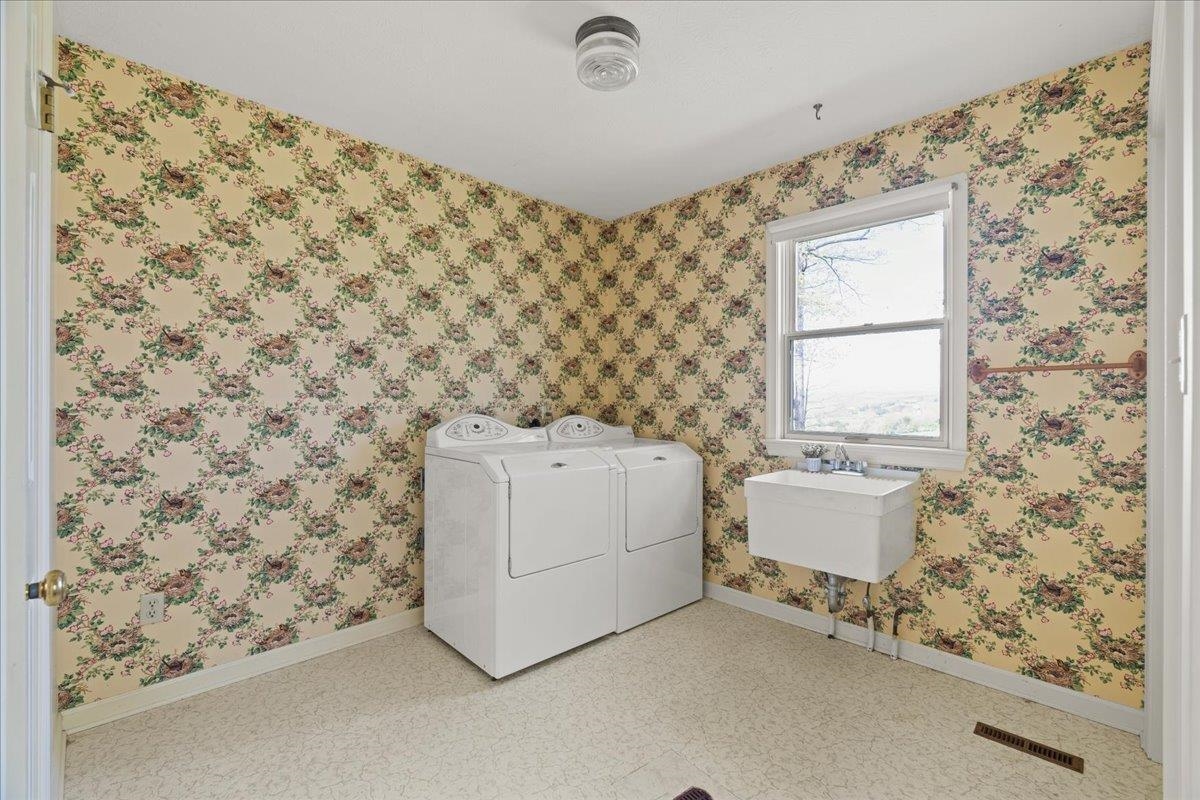140 Swisher Road Staunton, VA 24401 - Photo 20 of 53 a bathroom with a sink and a window