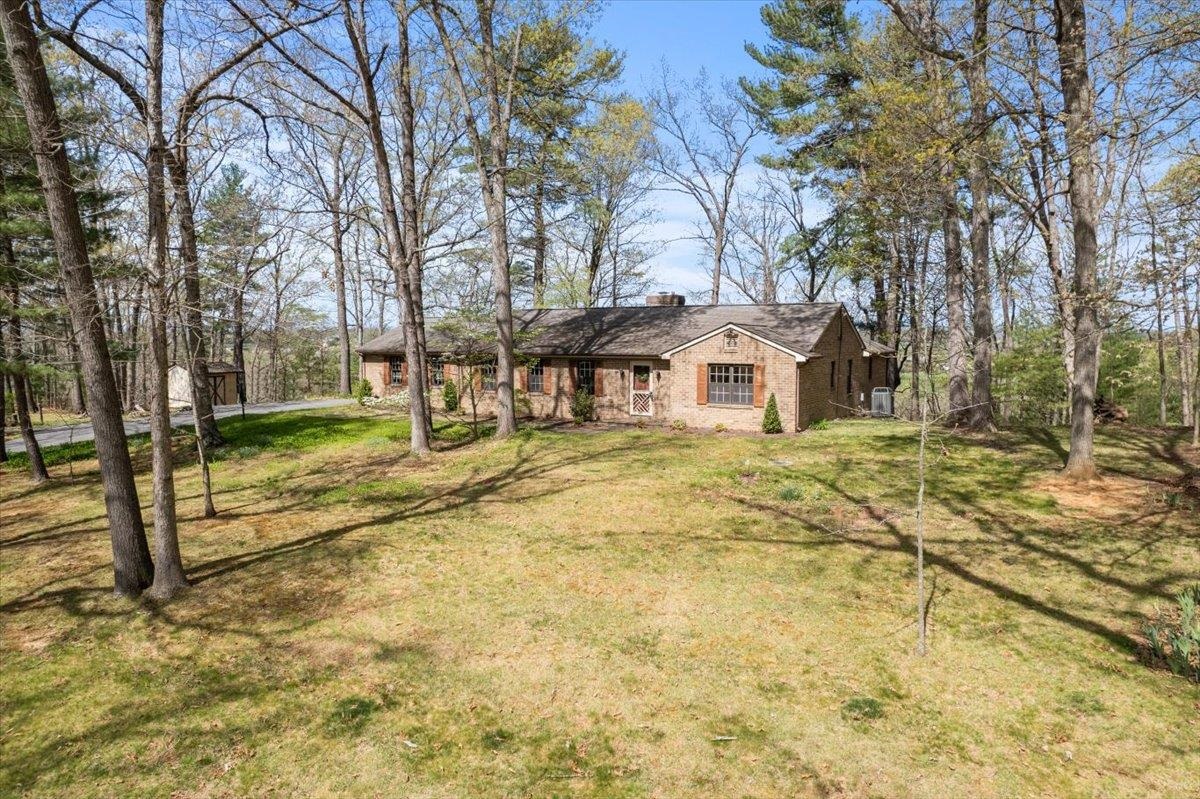 140 Swisher Road Staunton, VA 24401 - Photo 2 of 53 a front view of a house with a yard