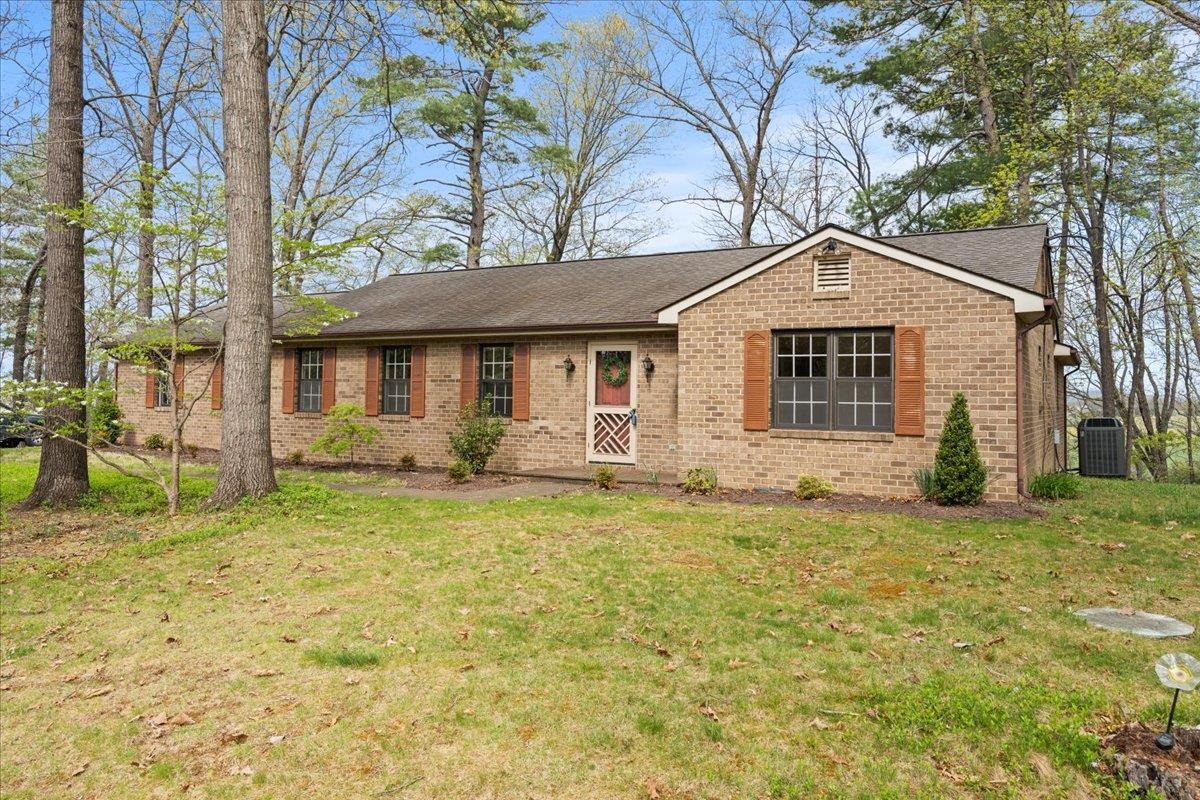 140 Swisher Road Staunton, VA 24401 - Photo 33 of 53 a front view of a house with a garden