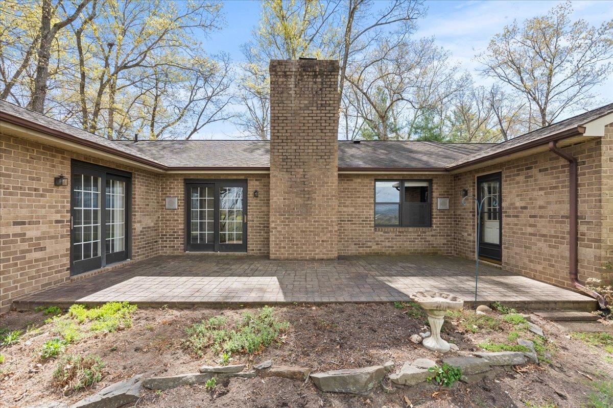140 Swisher Road Staunton, VA 24401 - Photo 35 of 53 a front view of a house with a garden and yard