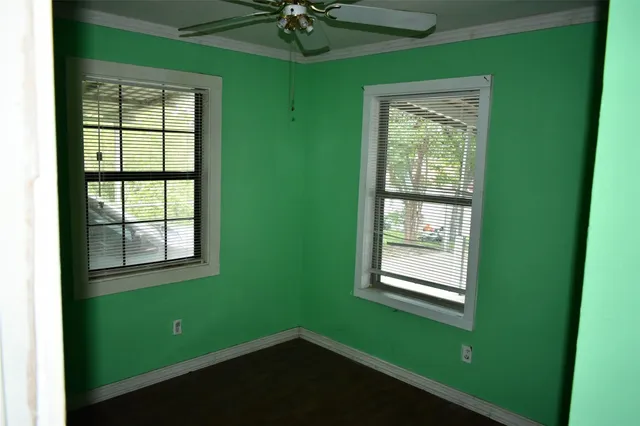a view of a room that has a window in it