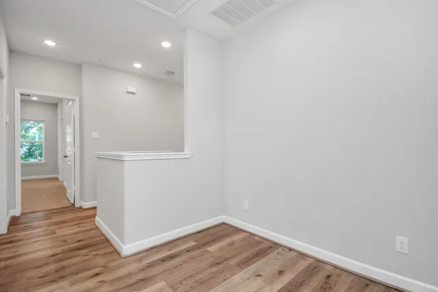 a white bath tub sitting next to a window