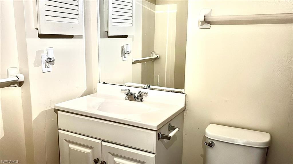 5315 Summerlin Road, Unit 1508 Fort Myers, FL 33919 - Photo 14 of 46 a bathroom with a sink toilet and shower