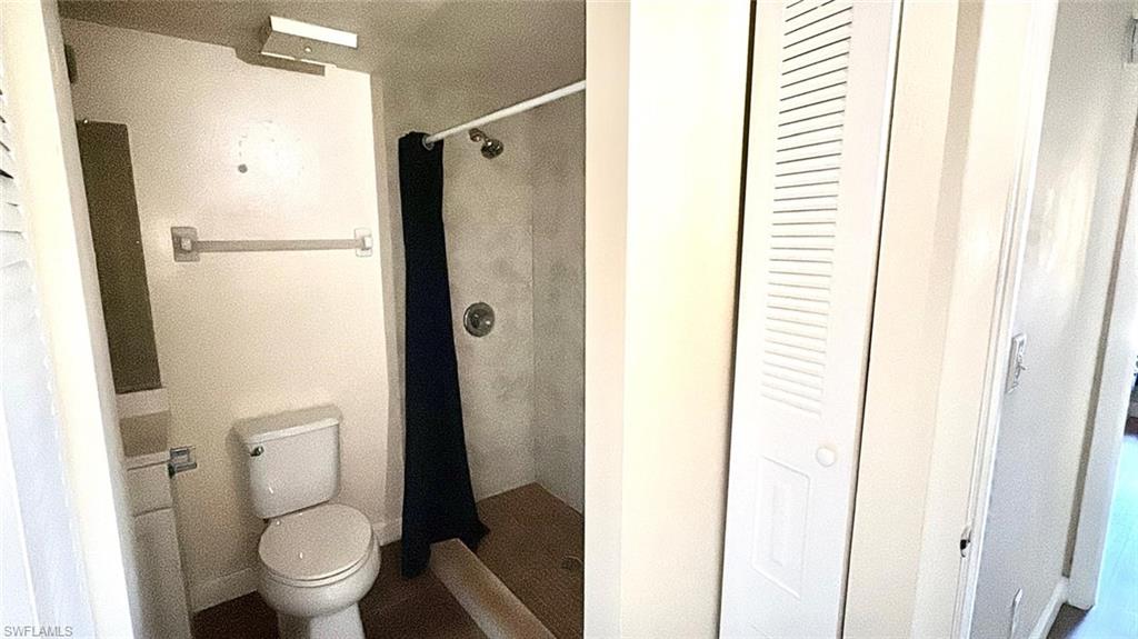 5315 Summerlin Road, Unit 1508 Fort Myers, FL 33919 - Photo 23 of 46 a bathroom with a toilet and a shower